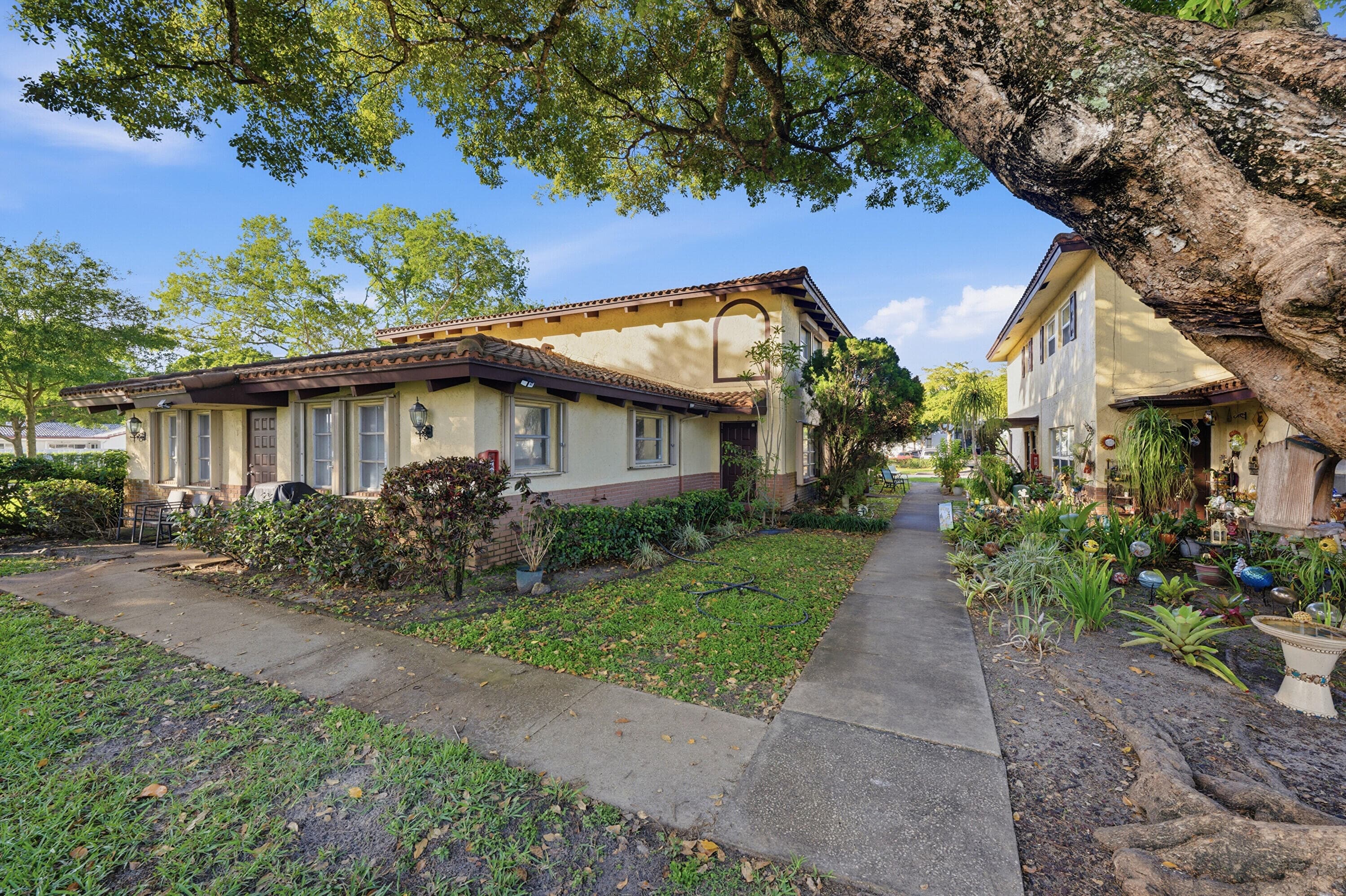 8811 NW 28th Drive 1-2, Coral Springs, FL 33065 — photo 1 of 40