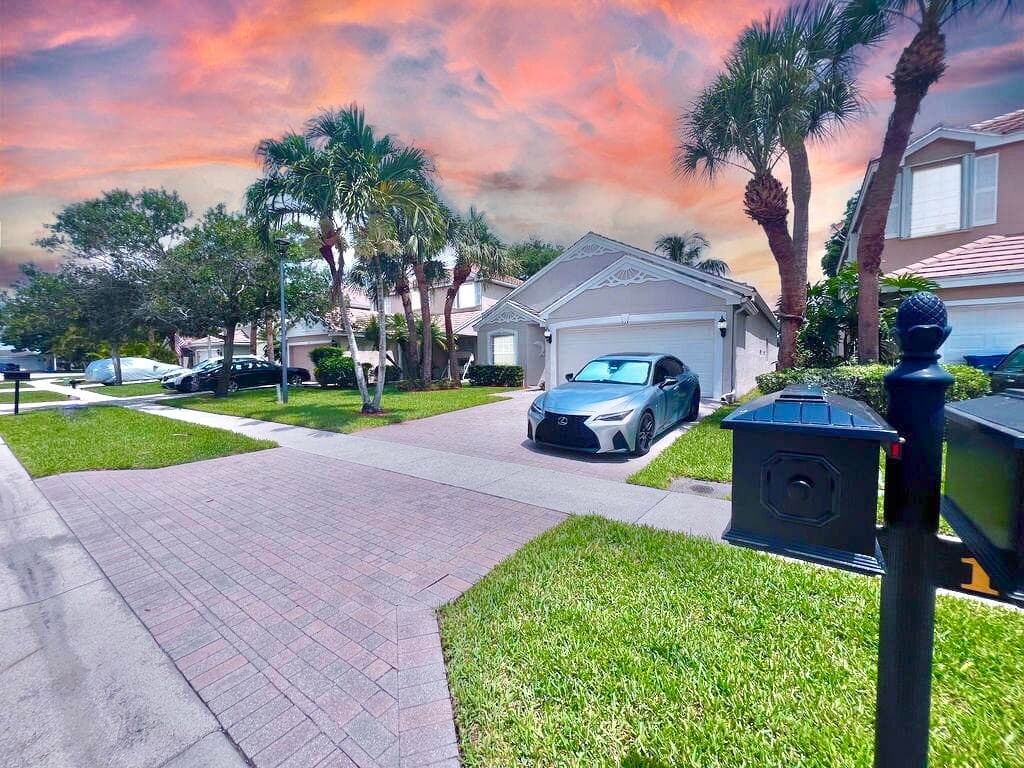 137 Canterbury Place, Royal Palm Beach, FL 33414 — photo 1 of 40