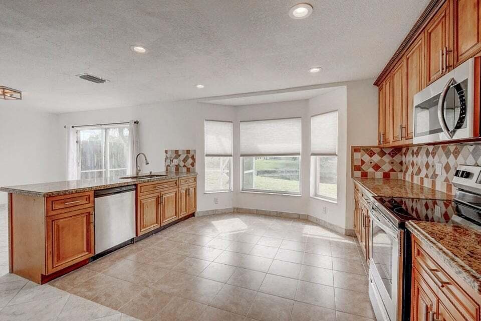 10758 Lake Jasmine Drive, Boca Raton, FL 33498 — photo 3 of 34
