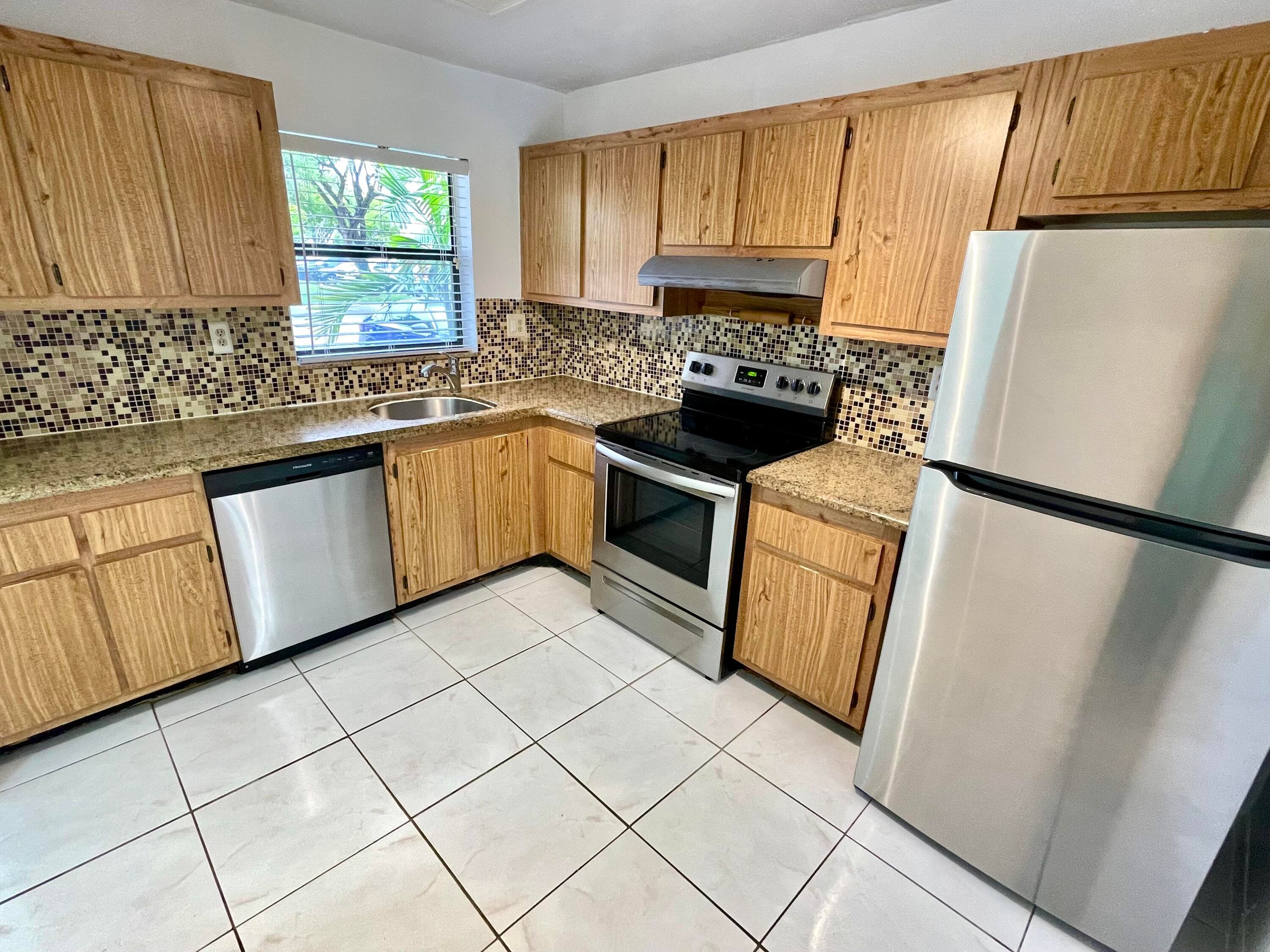 10442 Sunrise Lakes Boulevard 104, Sunrise, FL 33322 — photo 1 of 23