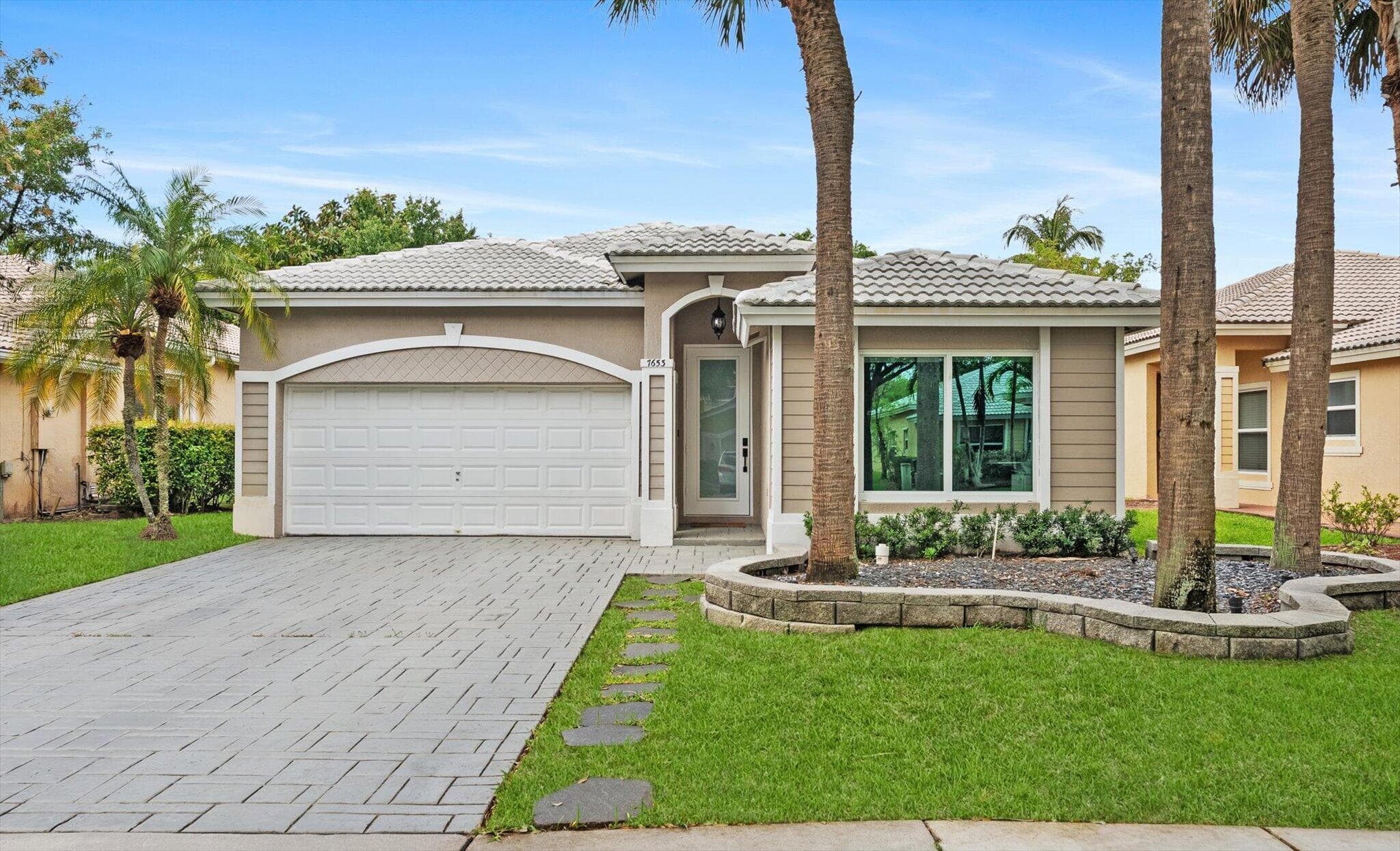 7653 NW 70th Avenue, Parkland, FL 33067 — photo 1 of 45
