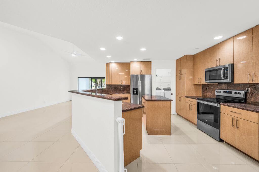 65 Centennial Court, Deerfield Beach, FL 33442 — photo 3 of 52
