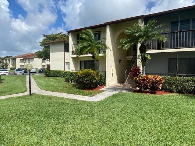 202 Foxtail Drive F1, Greenacres, FL 33415 — photo 1 of 31