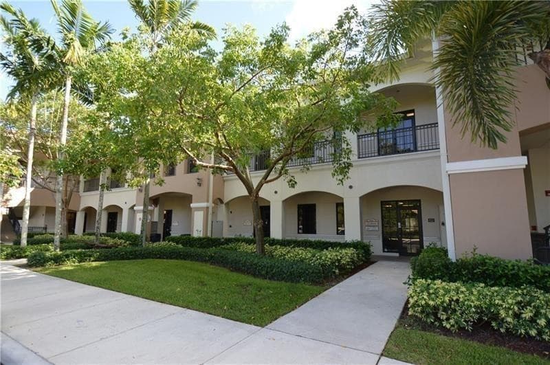 7551 Wiles Road 103, Coral Springs, FL 33067 — photo 1 of 11