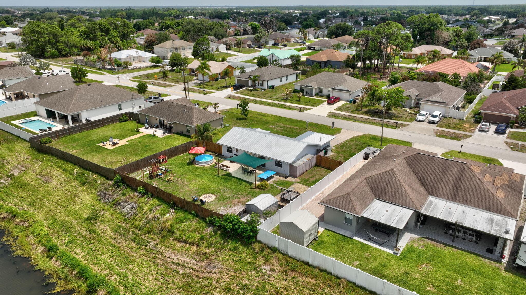 1031 SW Idol Avenue, Port St. Lucie, FL 34953 — photo 52 of 56