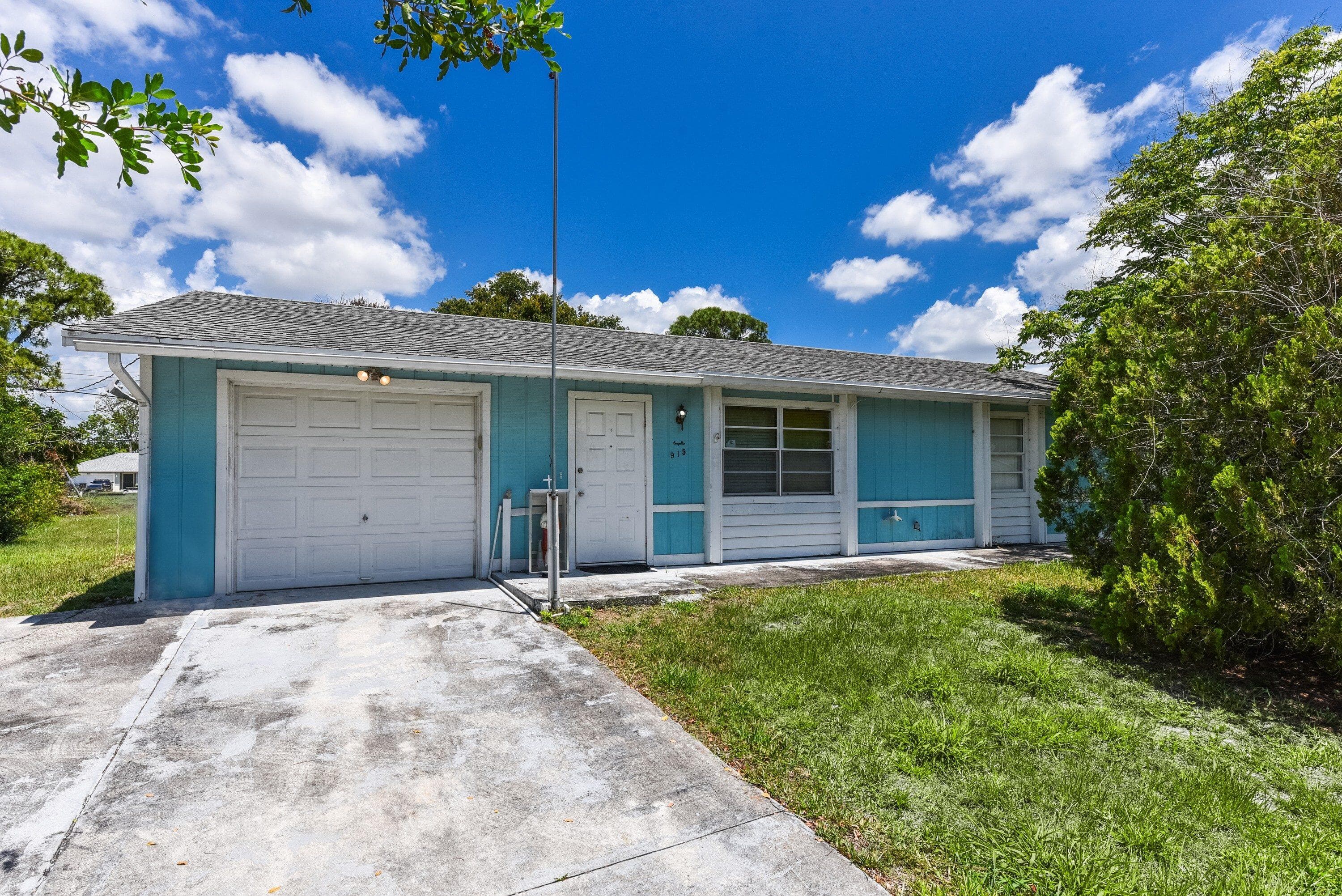 915 SW John Maccormack Terrace, Port St. Lucie, FL 34953 — photo 1 of 19