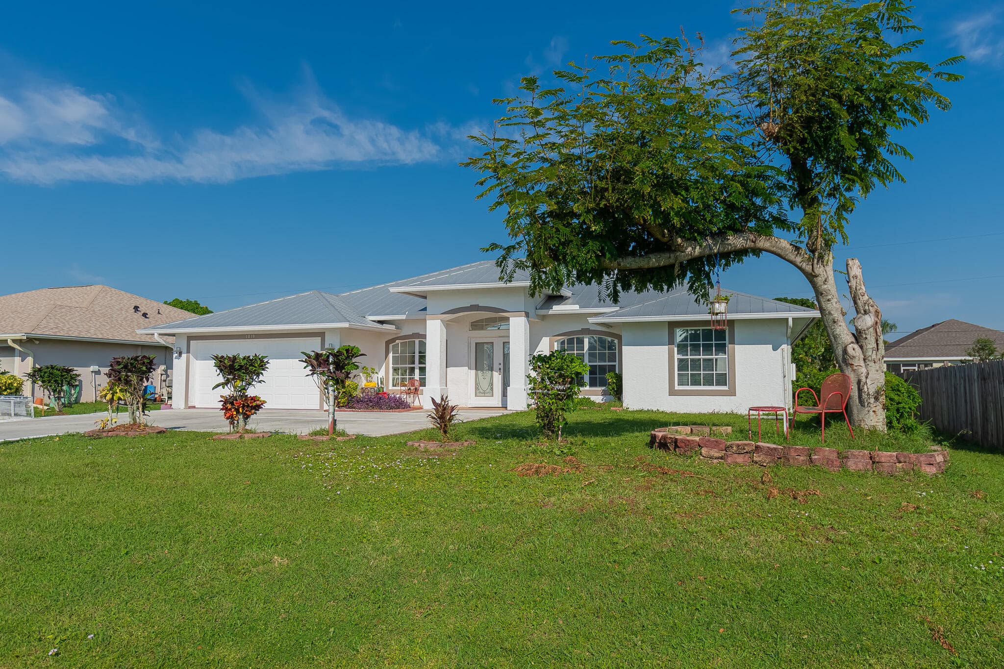 1019 SW California Boulevard, Port St. Lucie, FL 34953 — photo 1 of 23