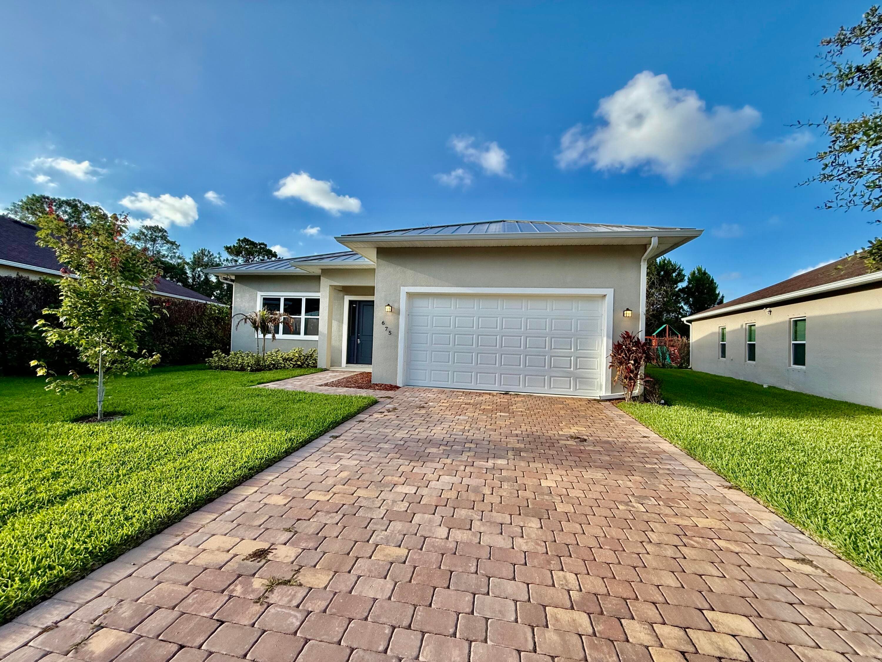 675 NE Moss Rose Place, Port St. Lucie, FL 34983 — photo 2 of 26