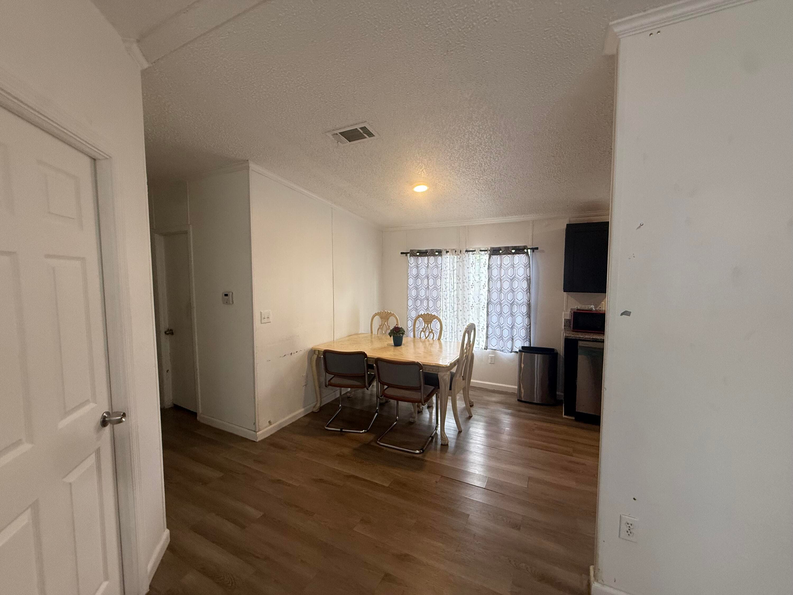 10548 W Sandalfoot Blvd W, Watergate, FL 33428 — photo 4 of 19