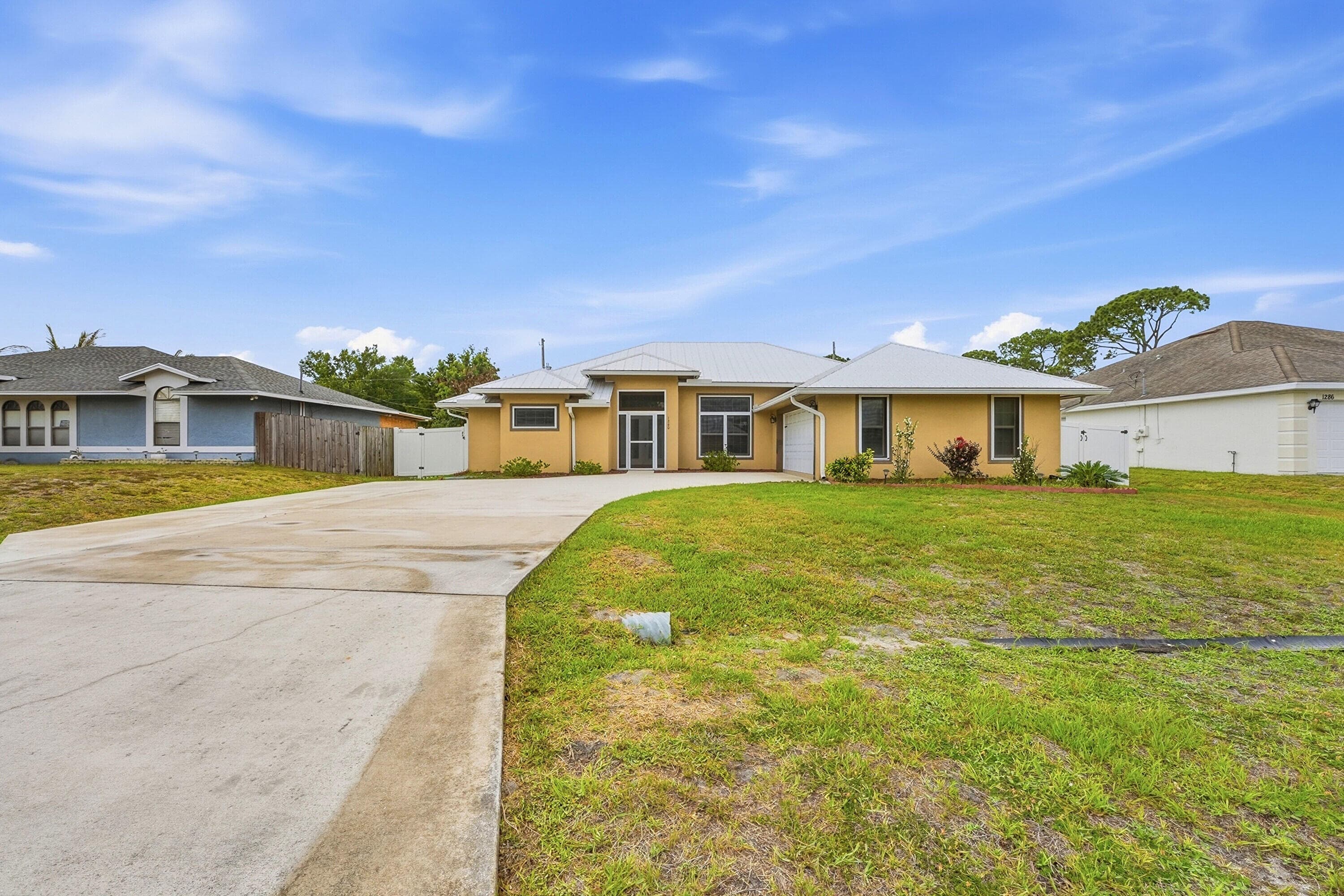 1280 SW Kalevala Drive, Port St. Lucie, FL 34953 — photo 3 of 36