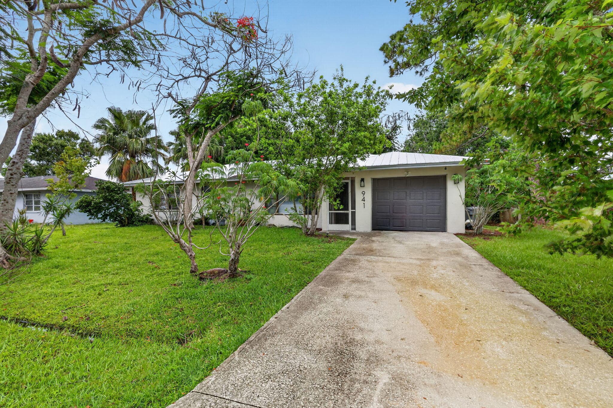 941 SE Atlantus Avenue, Port St. Lucie, FL 34983 — photo 2 of 73