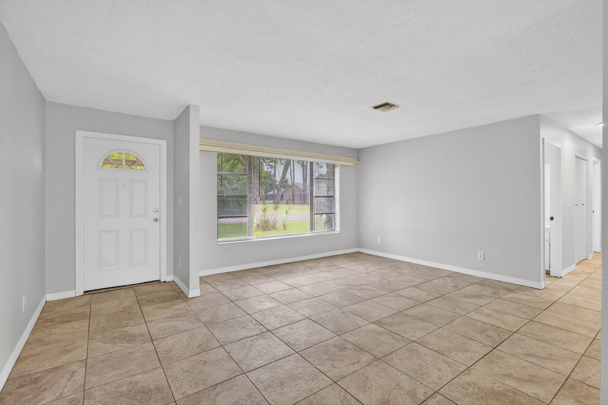 941 SE Atlantus Avenue, Port St. Lucie, FL 34983 — photo 6 of 73