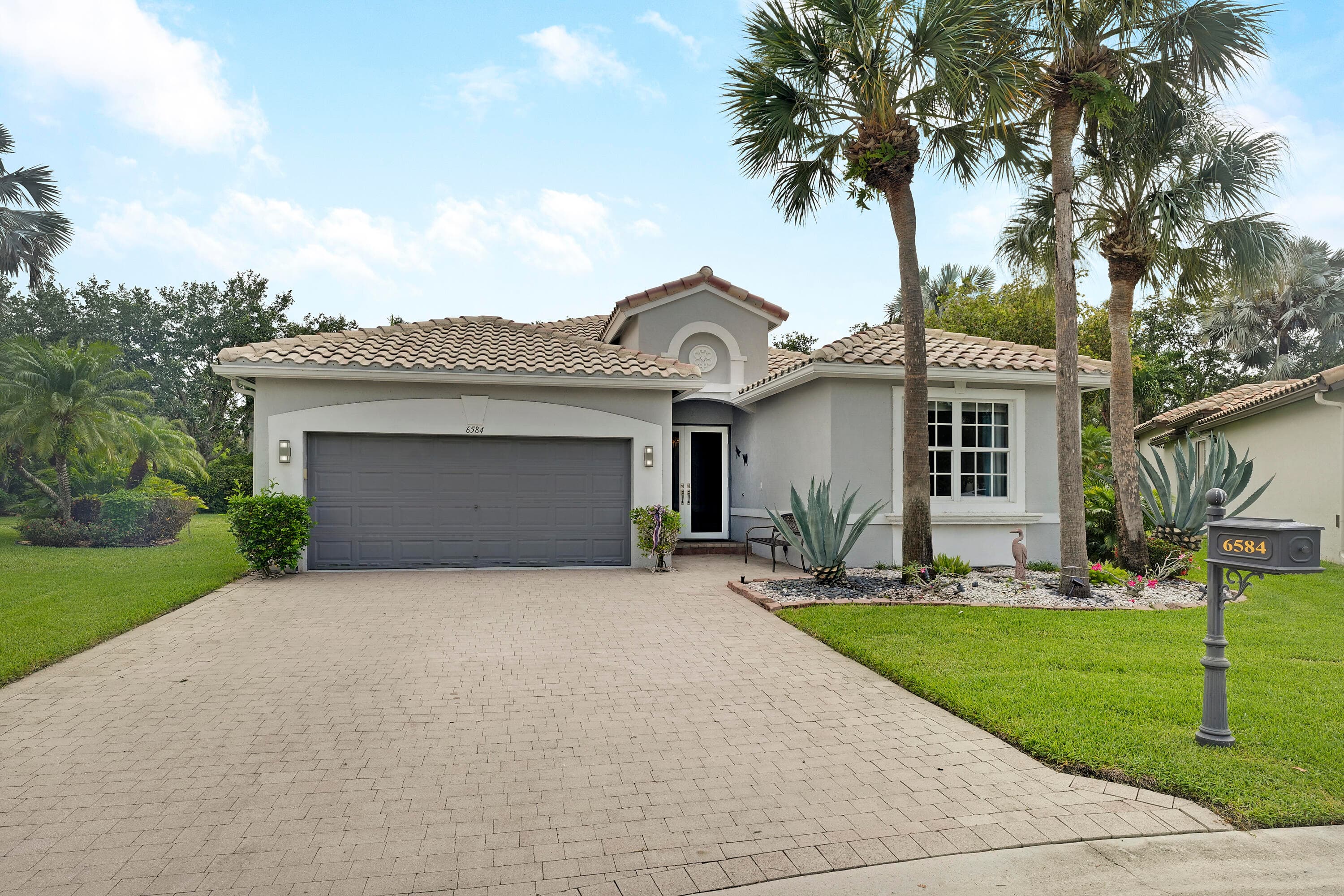 6584 Pavone Street, Lake Worth, FL 33467 — photo 2 of 70