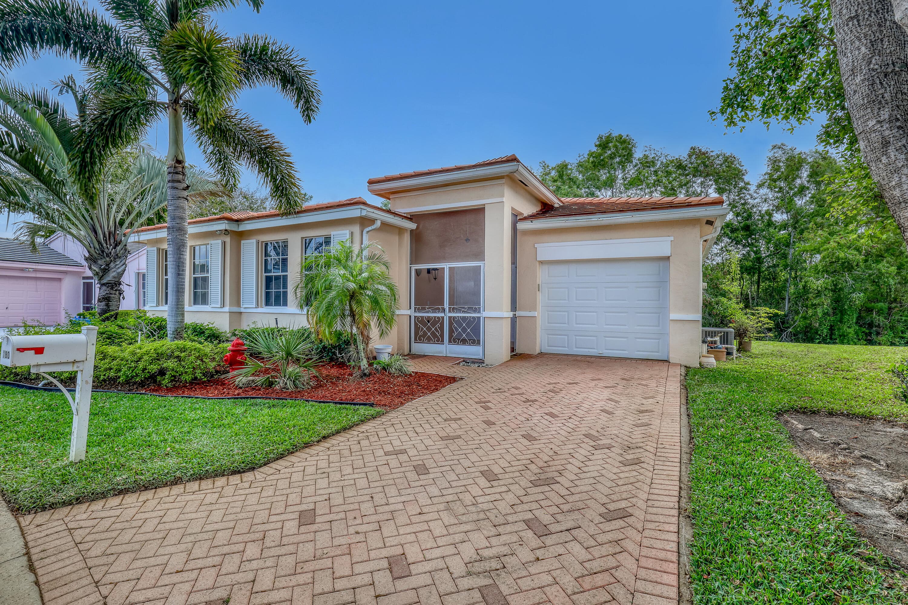 180 Caribe Court, Greenacres, FL 33413 — photo 1 of 28