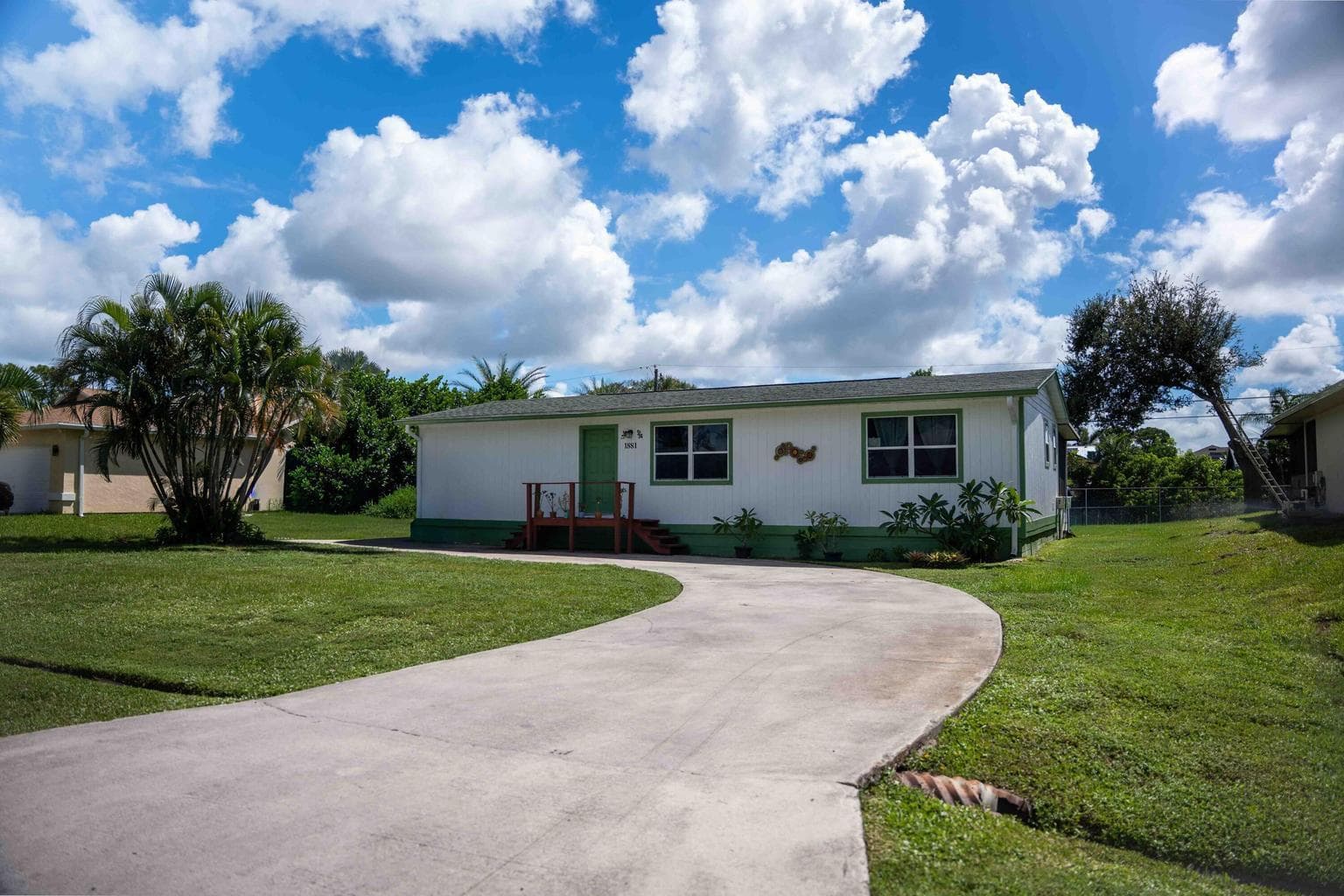 1881 SE Manth Lane, Port St. Lucie, FL 34983 — photo 1 of 14