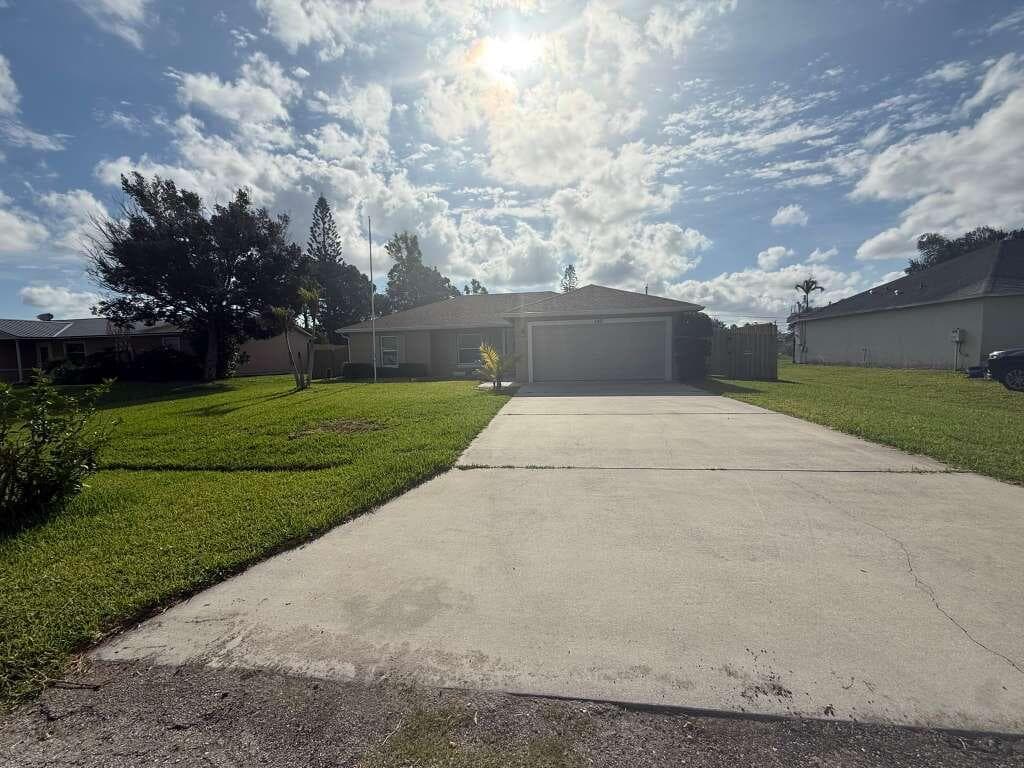 349 NW Hibiscus Street, Port St. Lucie, FL 34983 — photo 1 of 23