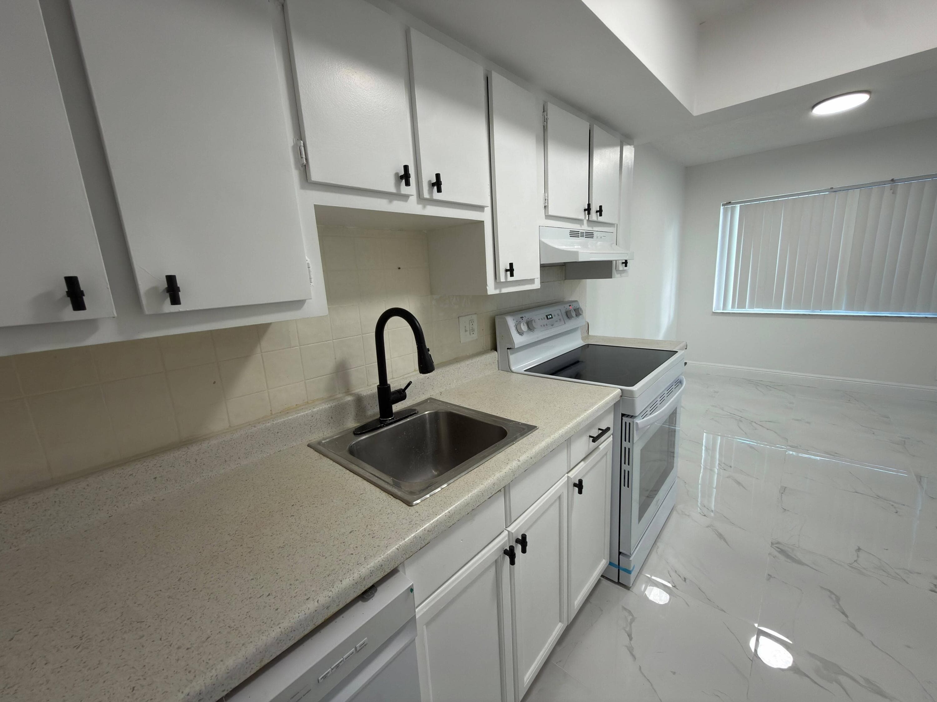 5702 NW 22nd Court 28-b, Lauderhill, FL 33313 — photo 10 of 36
