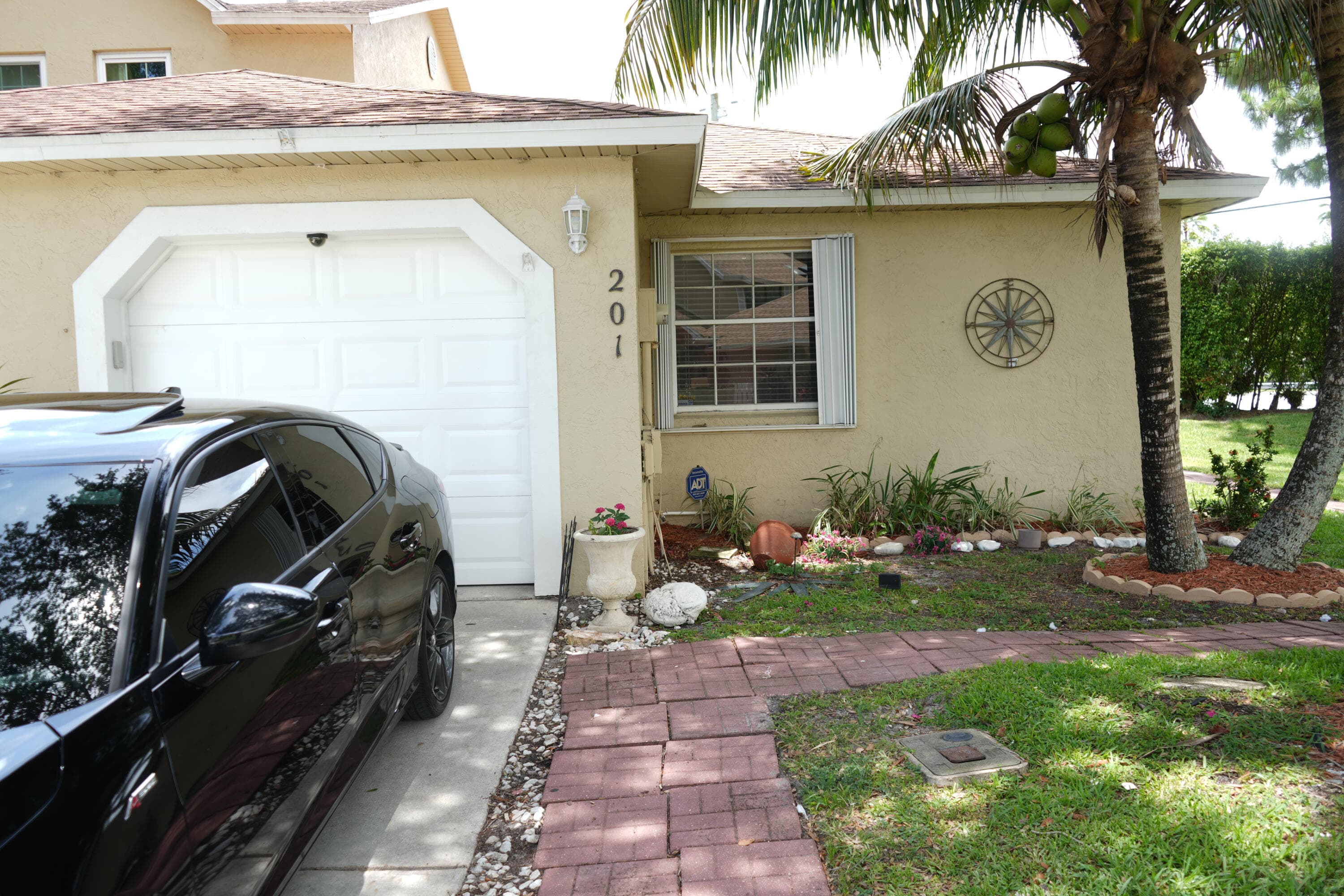 201 Maplewood Drive 201, Greenacres, FL 33415 — photo 1 of 26