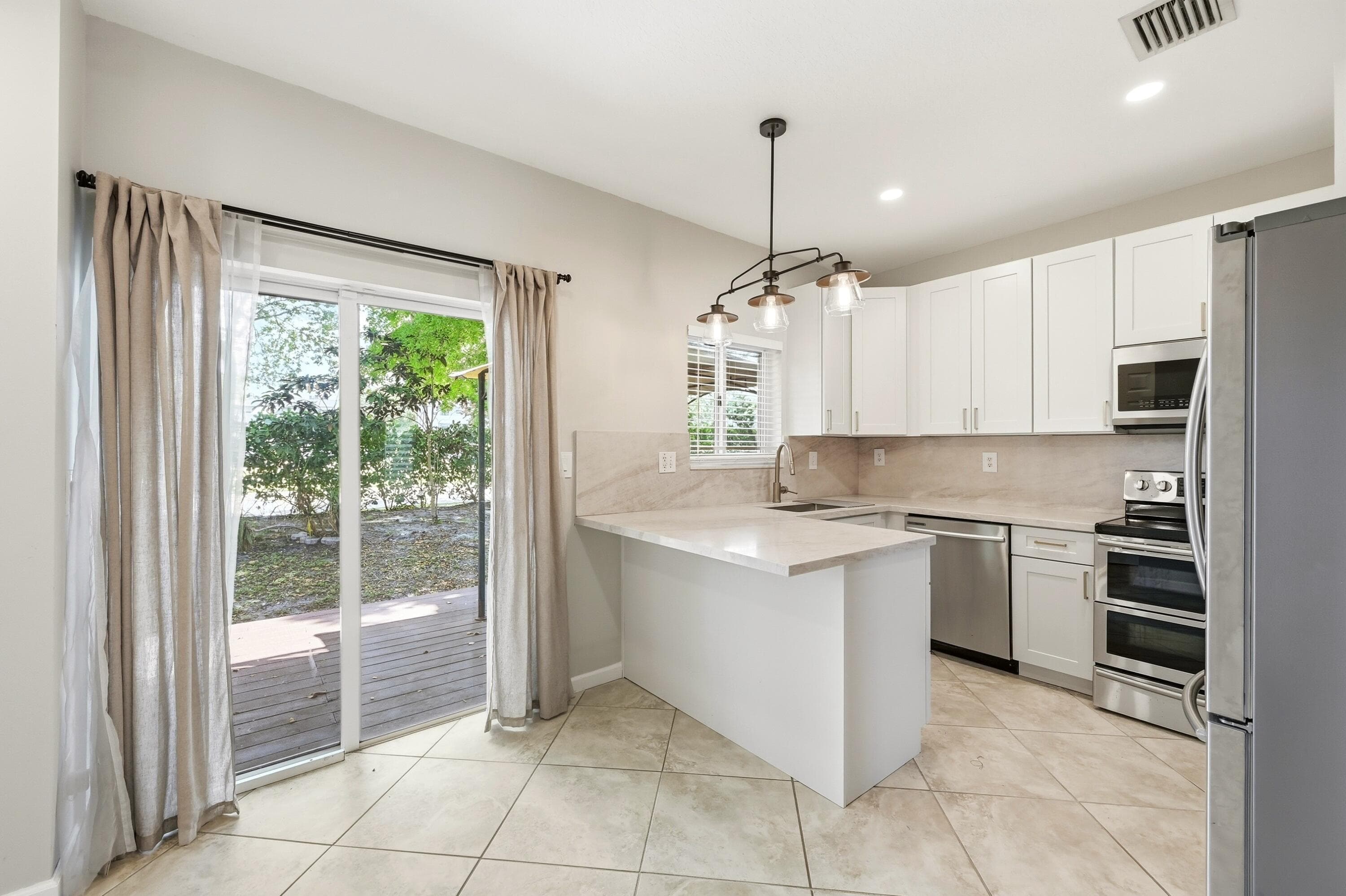 8464 Lagos De Campo Boulevard, Tamarac, FL 33321 — photo 2 of 43