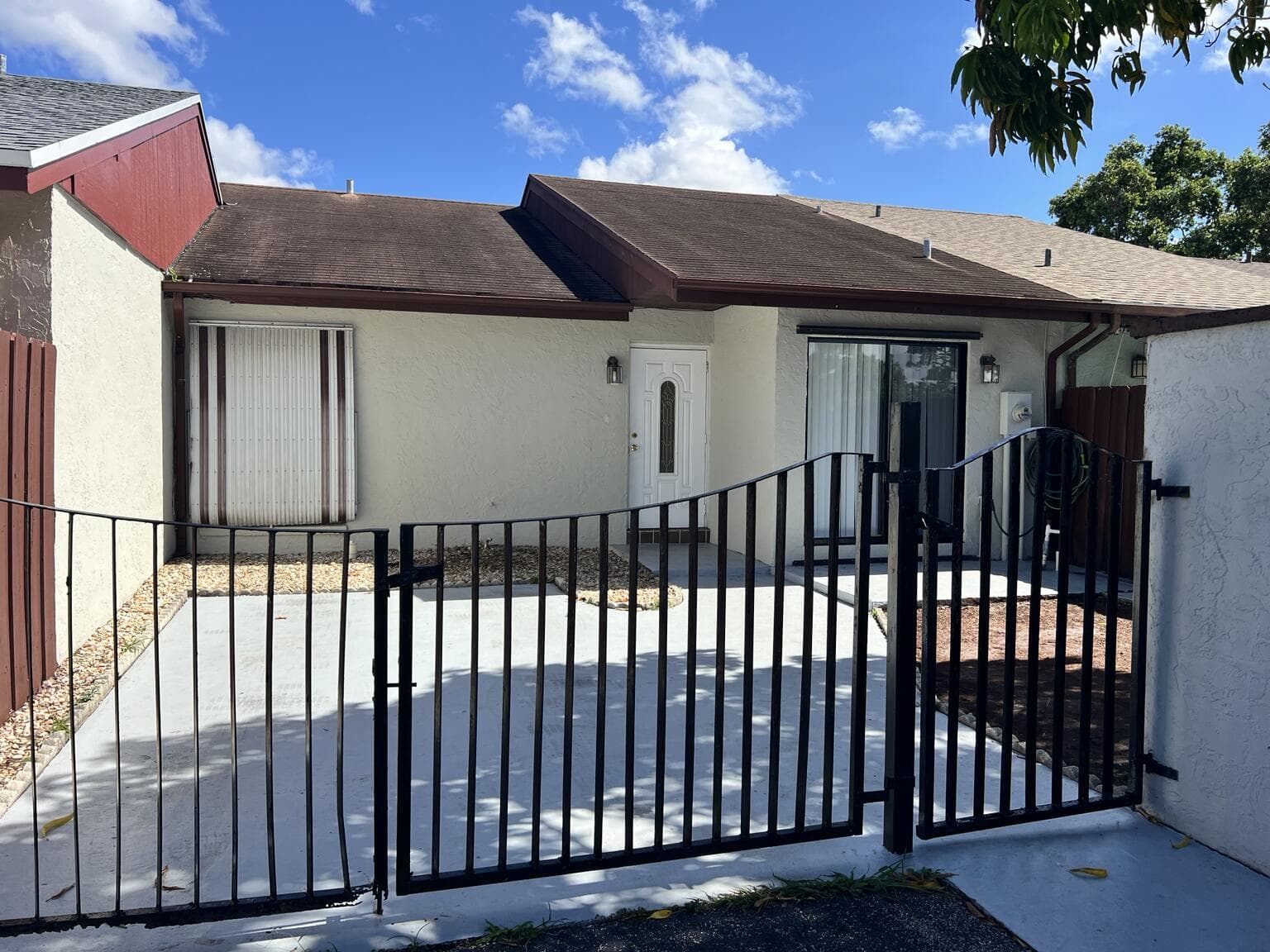 5672 Biscayne Drive S, Greenacres, FL 33463 — photo 1 of 21