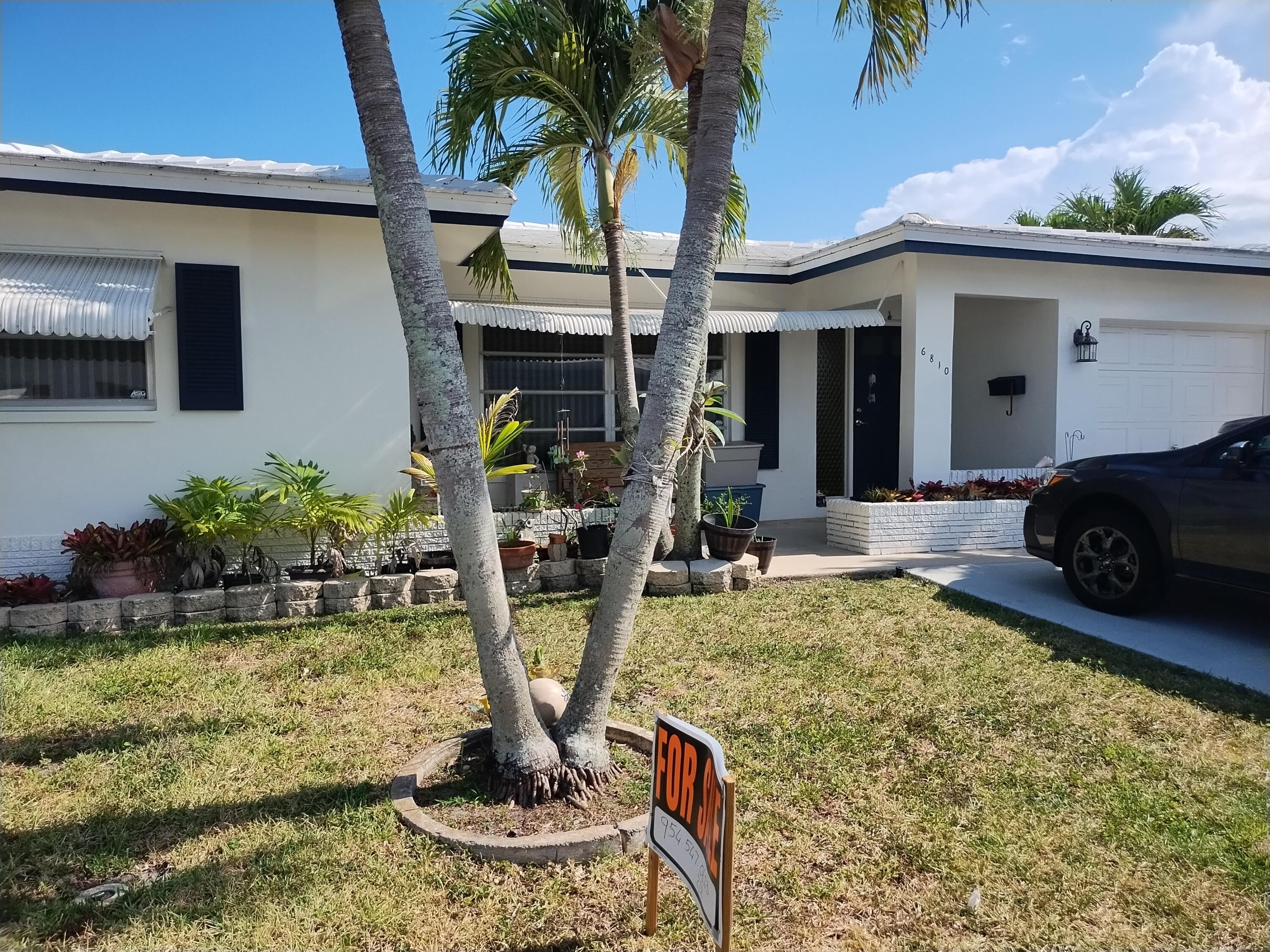 6810 NW 75th Street, Tamarac, FL 33321 — photo 1 of 13
