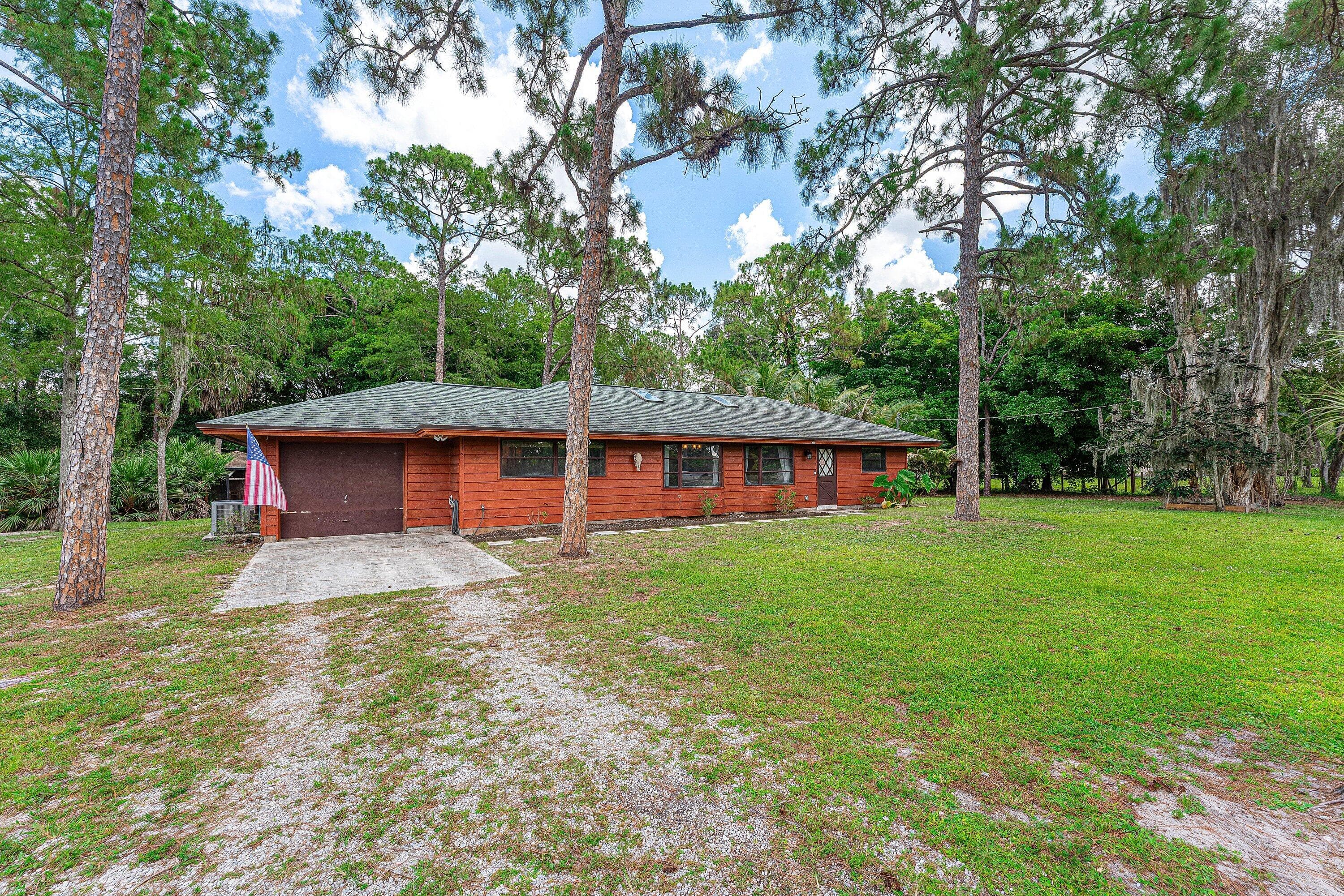 16355 Lancashire Drive E, Loxahatchee, FL 33470 — photo 2 of 29