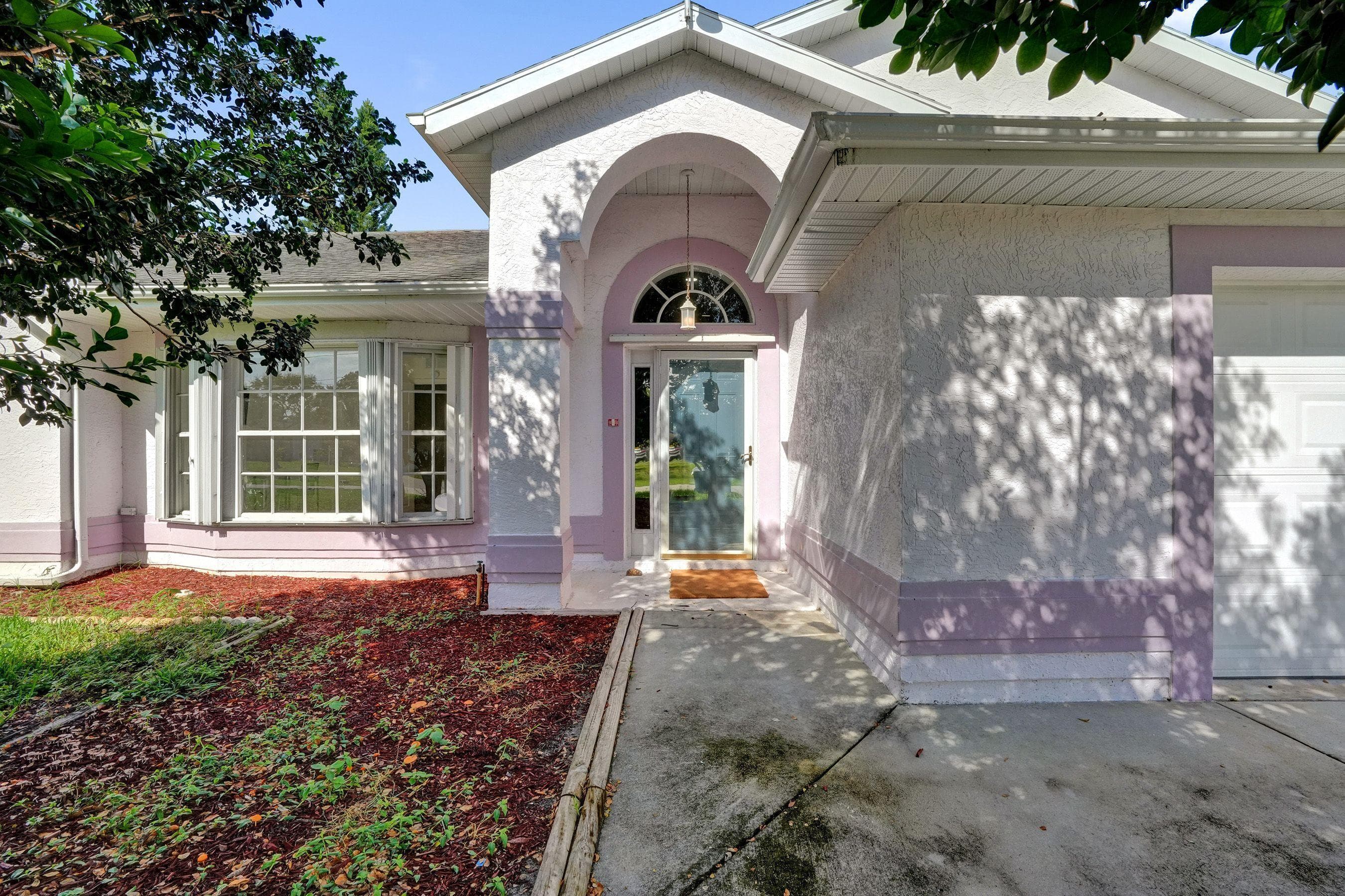 1212 SE Petunia Avenue, Port St. Lucie, FL 34952 — photo 2 of 19