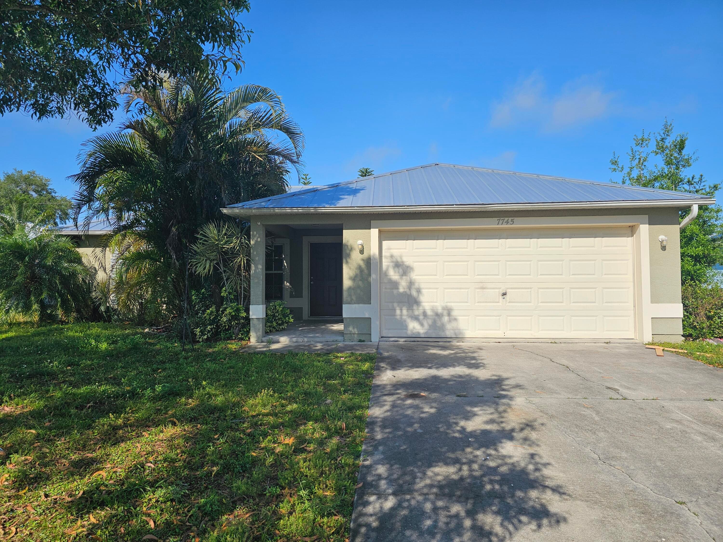 7745 99th Court, Vero Beach, FL 32967 — photo 1 of 41