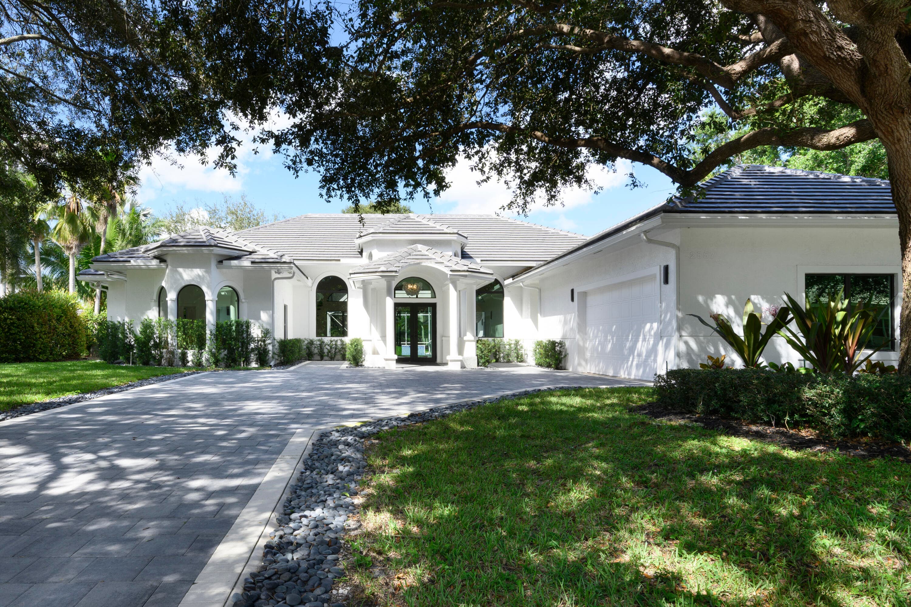 2557 Seminole Circle, West Palm Beach, FL 33409 — photo 1 of 65