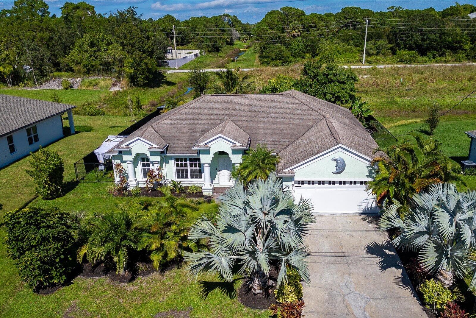 873 SW Tulip Boulevard, Port St. Lucie, FL 34953 — photo 2 of 49