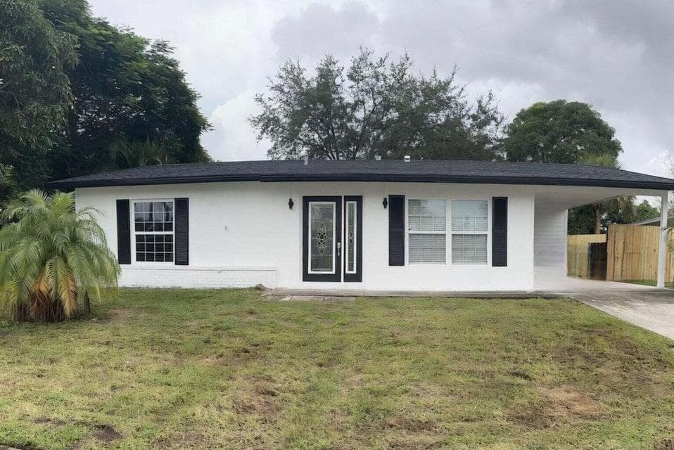 402 NE Armory Circle, Port St. Lucie, FL 34983 — photo 1 of 10