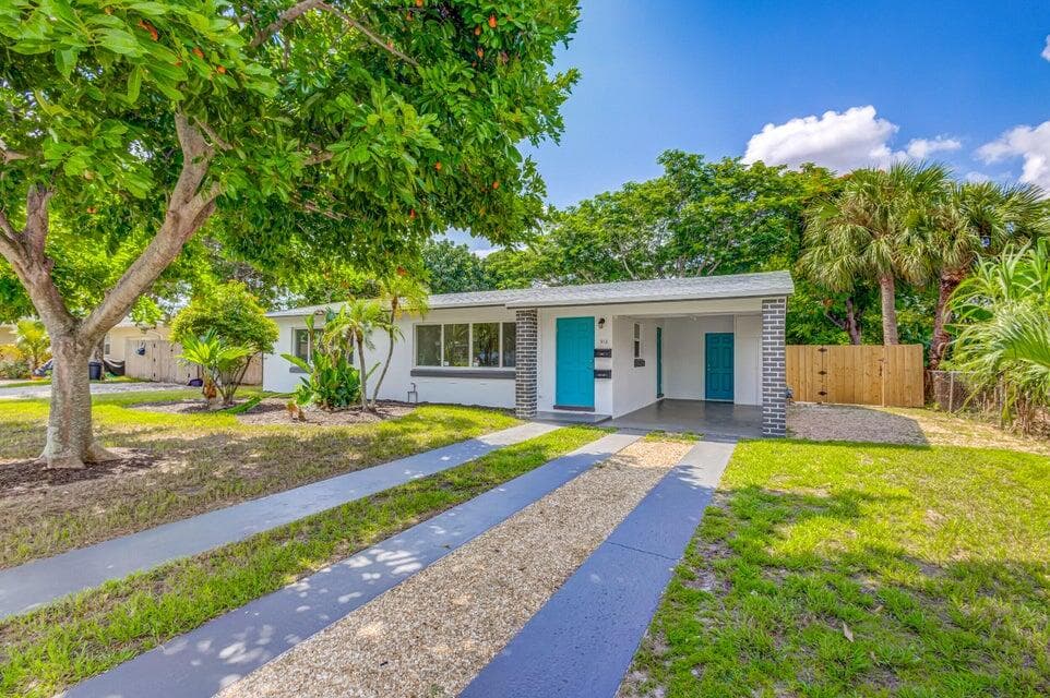 512 Bayberry Drive, Lake Park, FL 33403 — photo 1 of 44