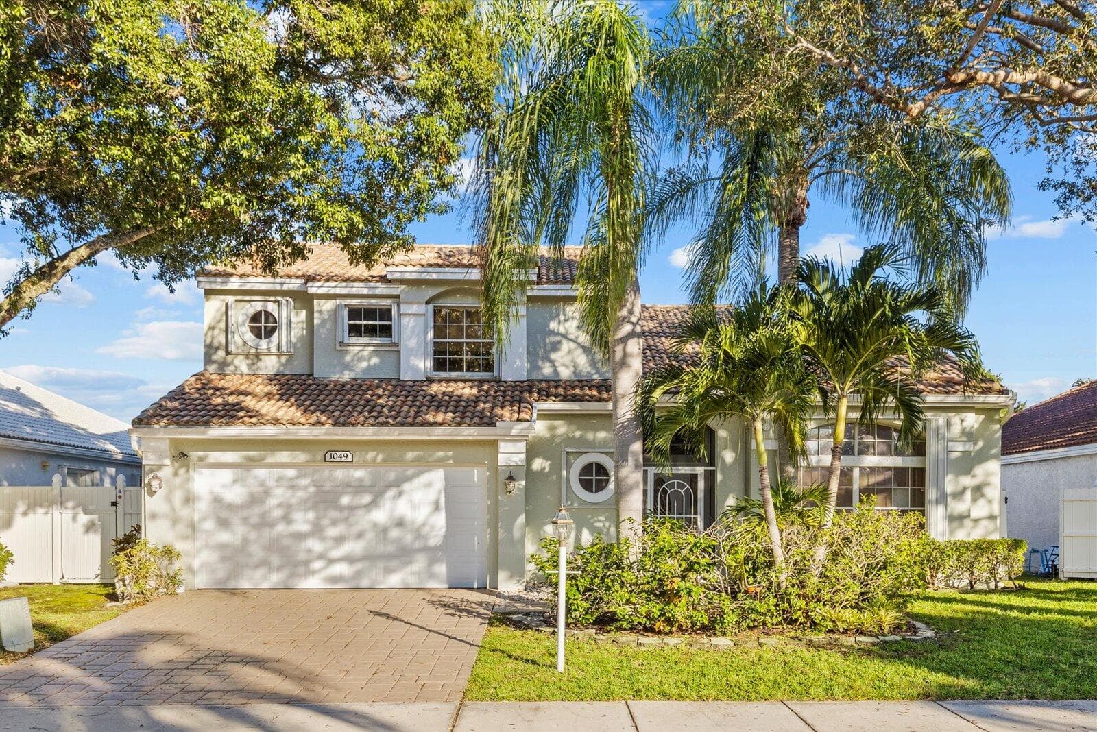 1049 Siena Oaks Circle E, Palm Beach Gardens, FL 33410 — photo 1 of 43