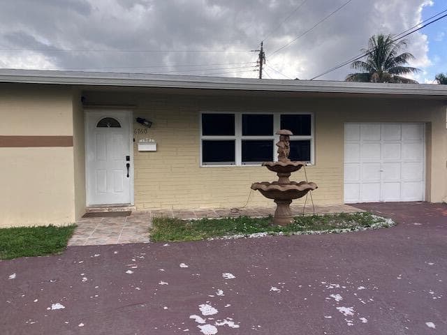 6760 NW 25 Court, Sunrise, FL 33313 — photo 1 of 17