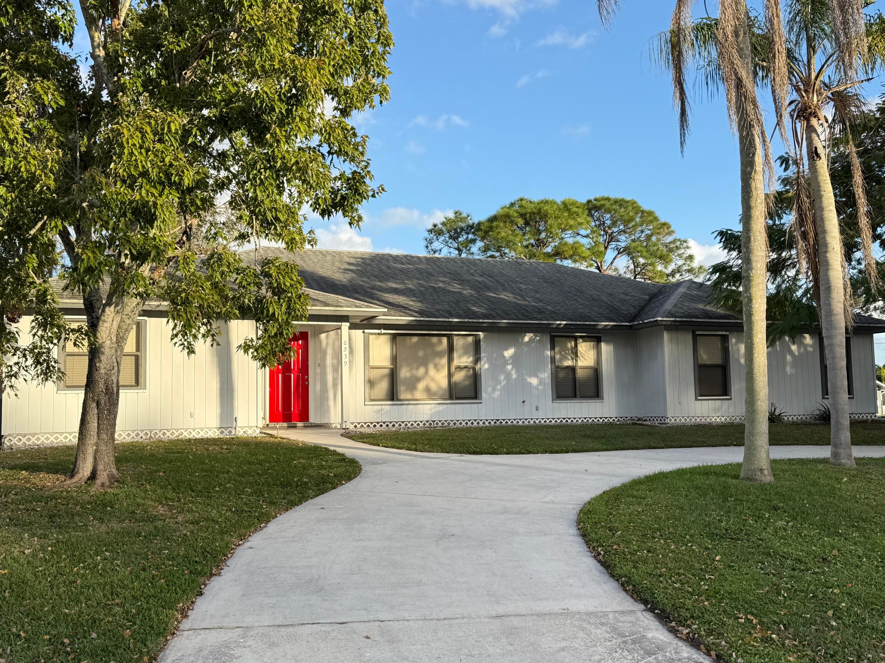 6539 SE Held Court, Stuart, FL 34997 — photo 1 of 34