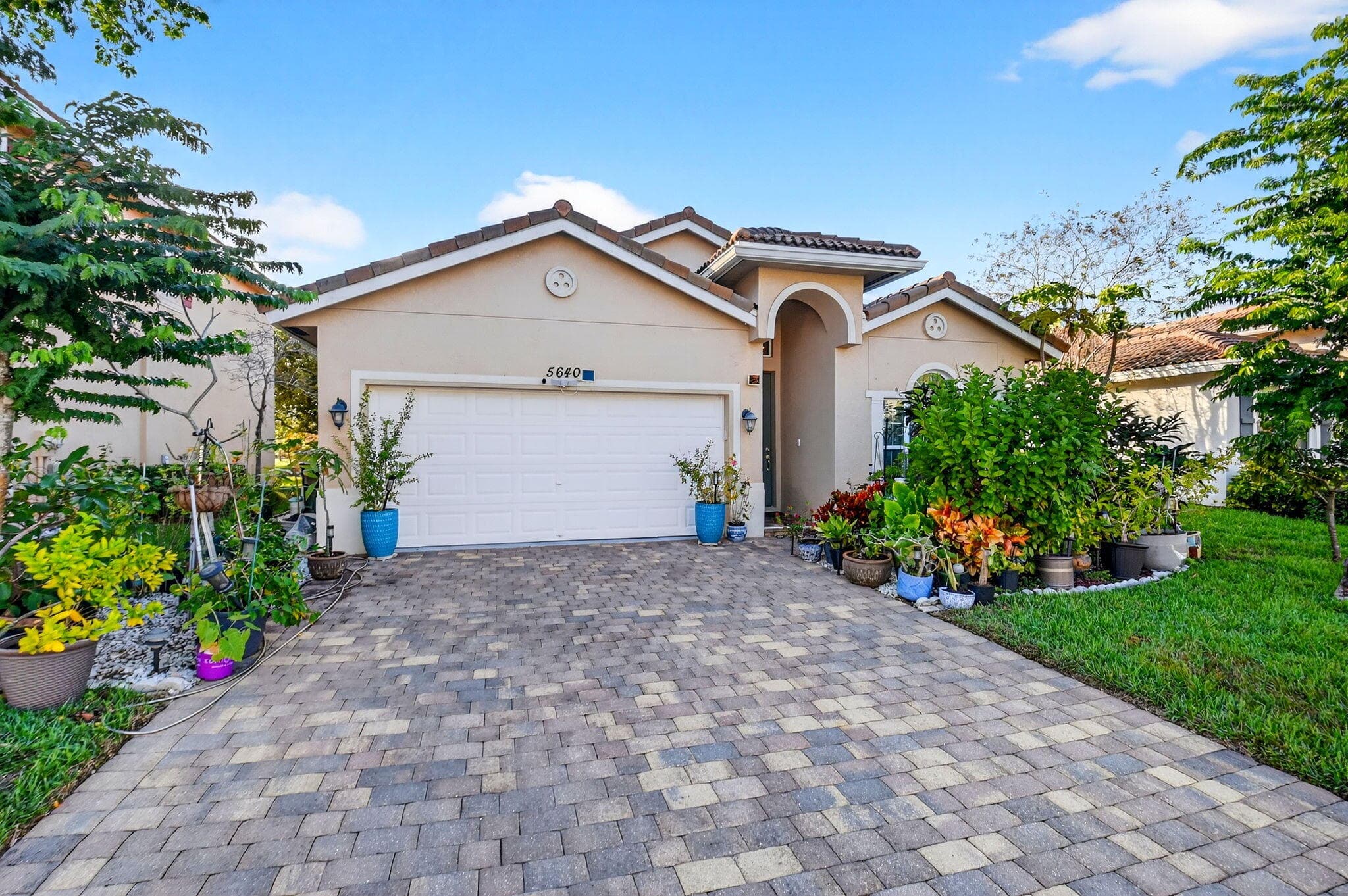 5640 Caranday Palm Drive, Greenacres, FL 33463 — photo 1 of 36