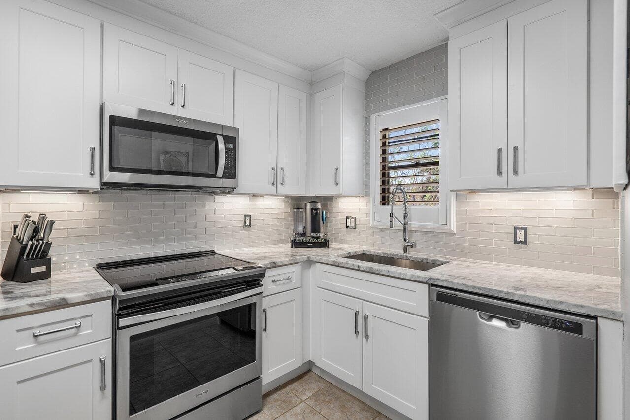 2420 Deer Creek Country Club Boulevard 205-d, Deerfield Beach, FL 33442 — photo 1 of 45