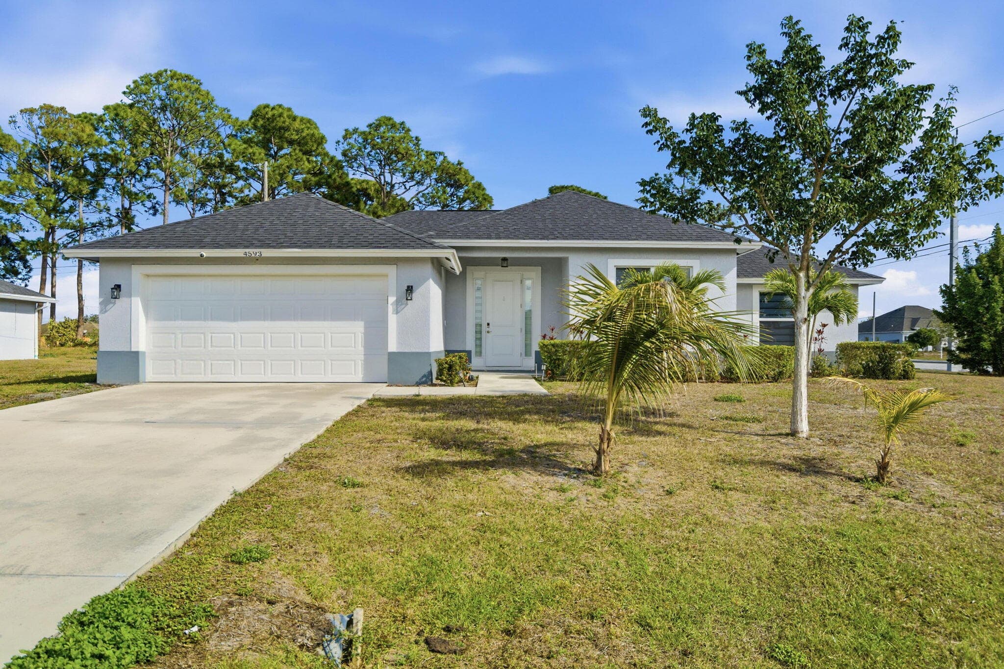 4593 SW Sw Bradbury St Street, Port St. Lucie, FL 34953 — photo 1 of 30