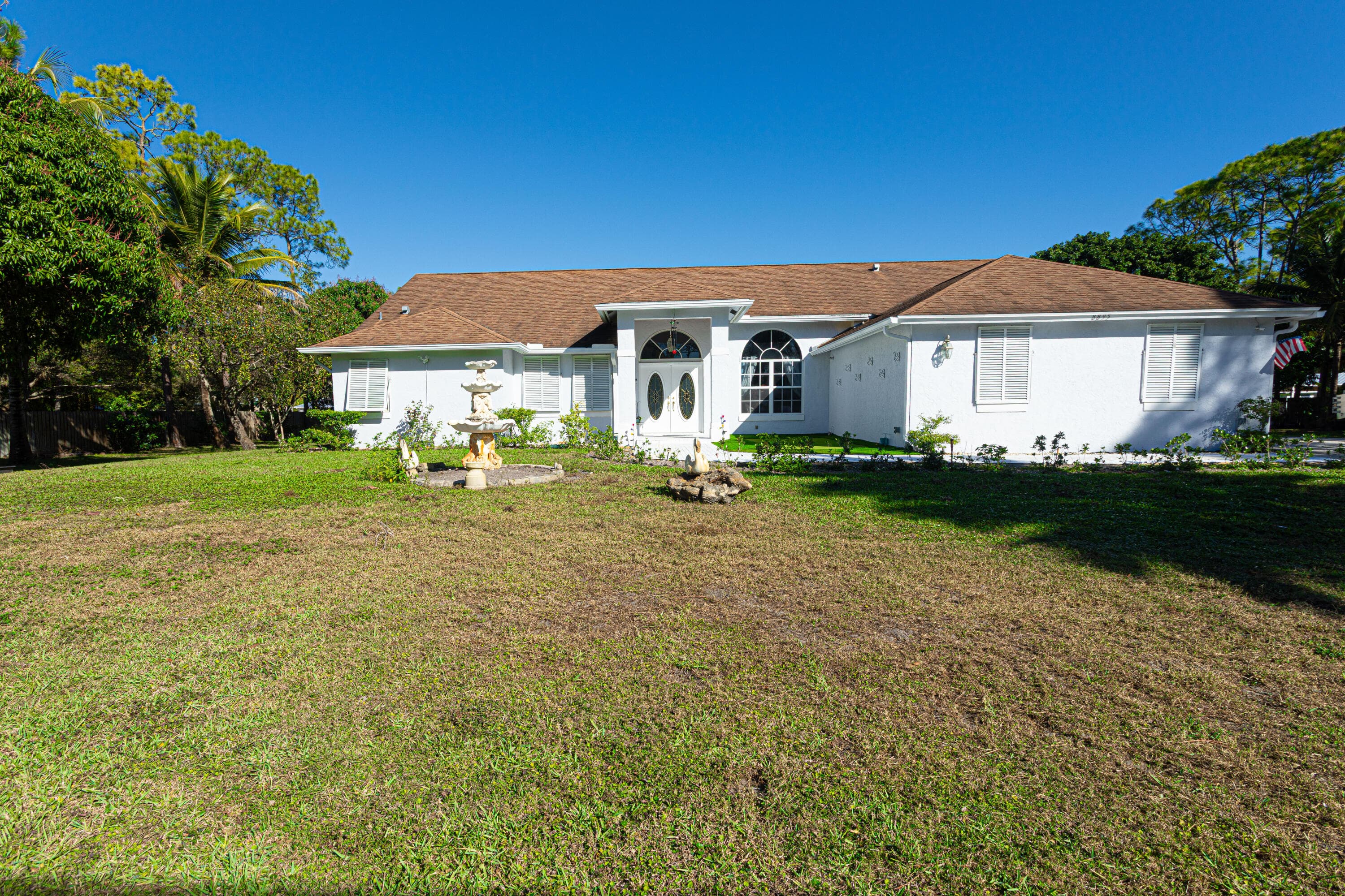 8895 Palomino Drive, Lake Worth, FL 33467 — photo 1 of 70