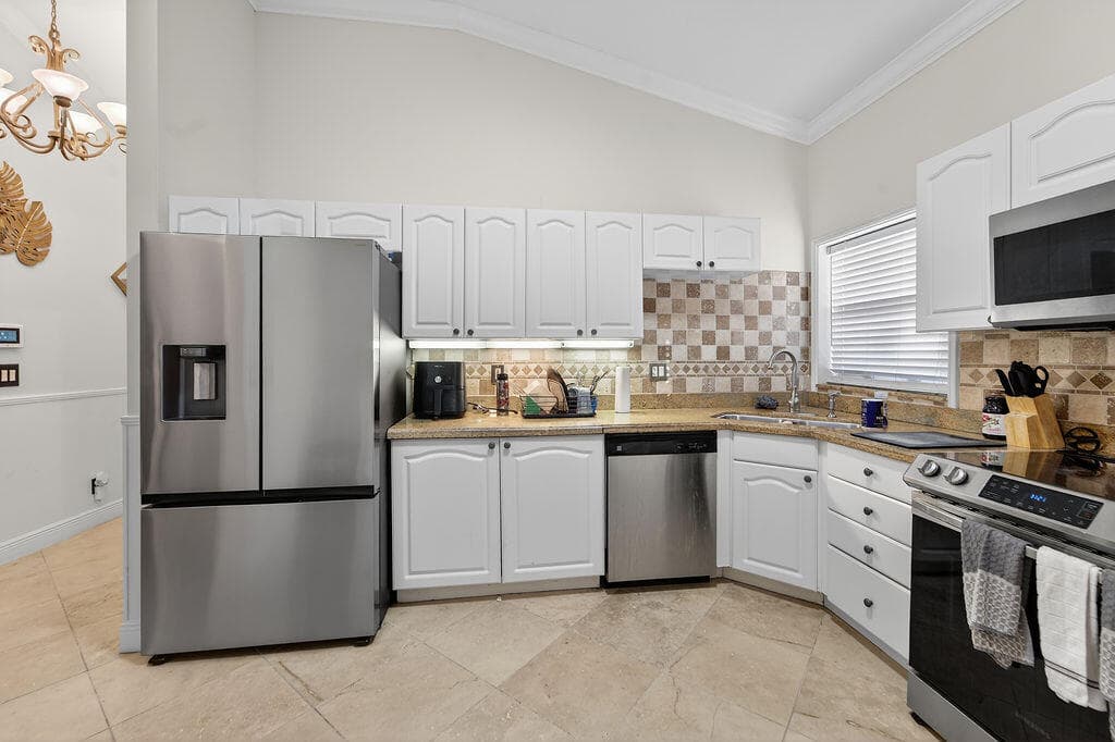 8063 Via Hacienda, Riviera Beach, FL 33418 — photo 3 of 42