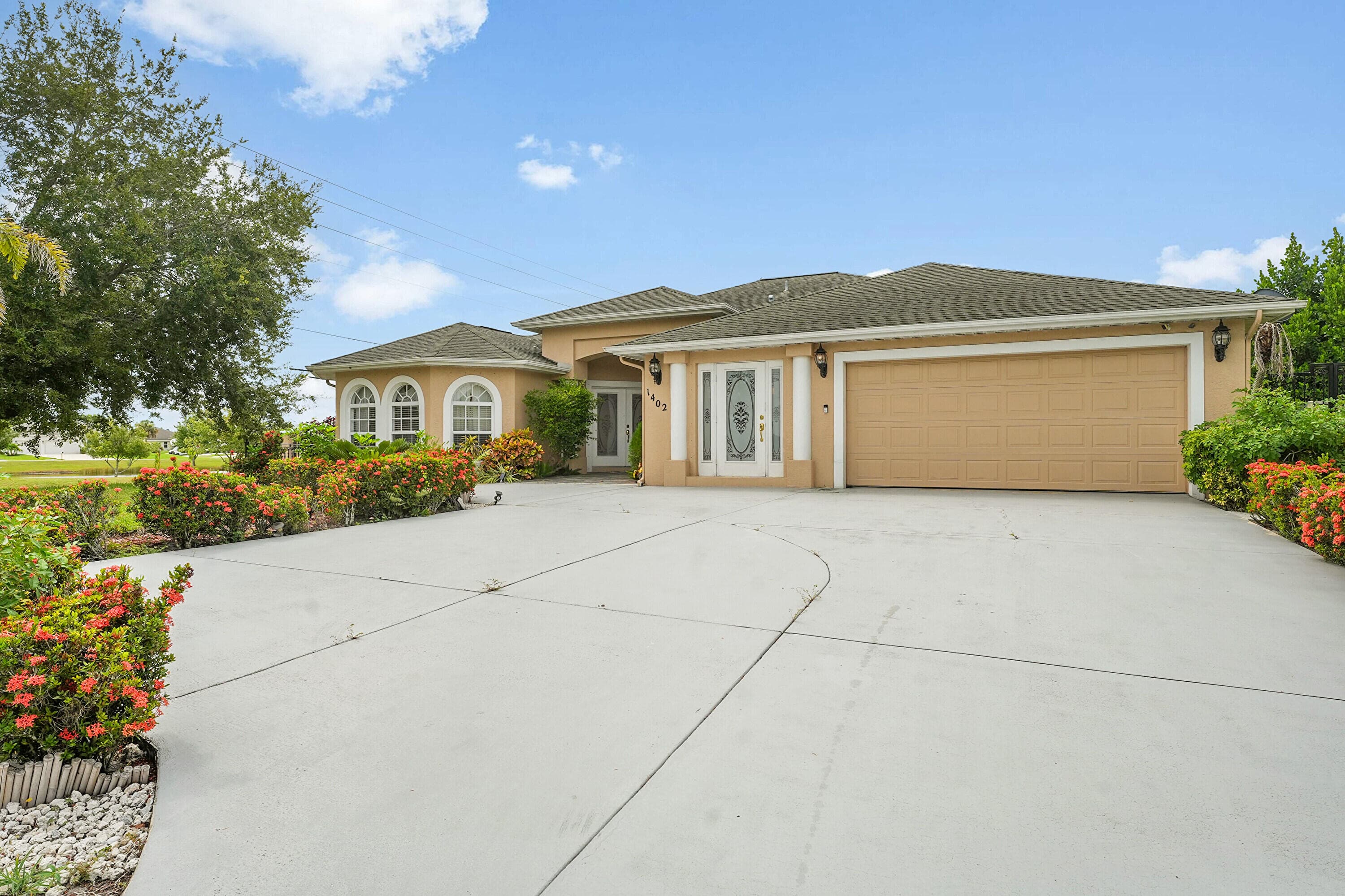 1402 SW Doe Court, Port St. Lucie, FL 34953 — photo 2 of 57