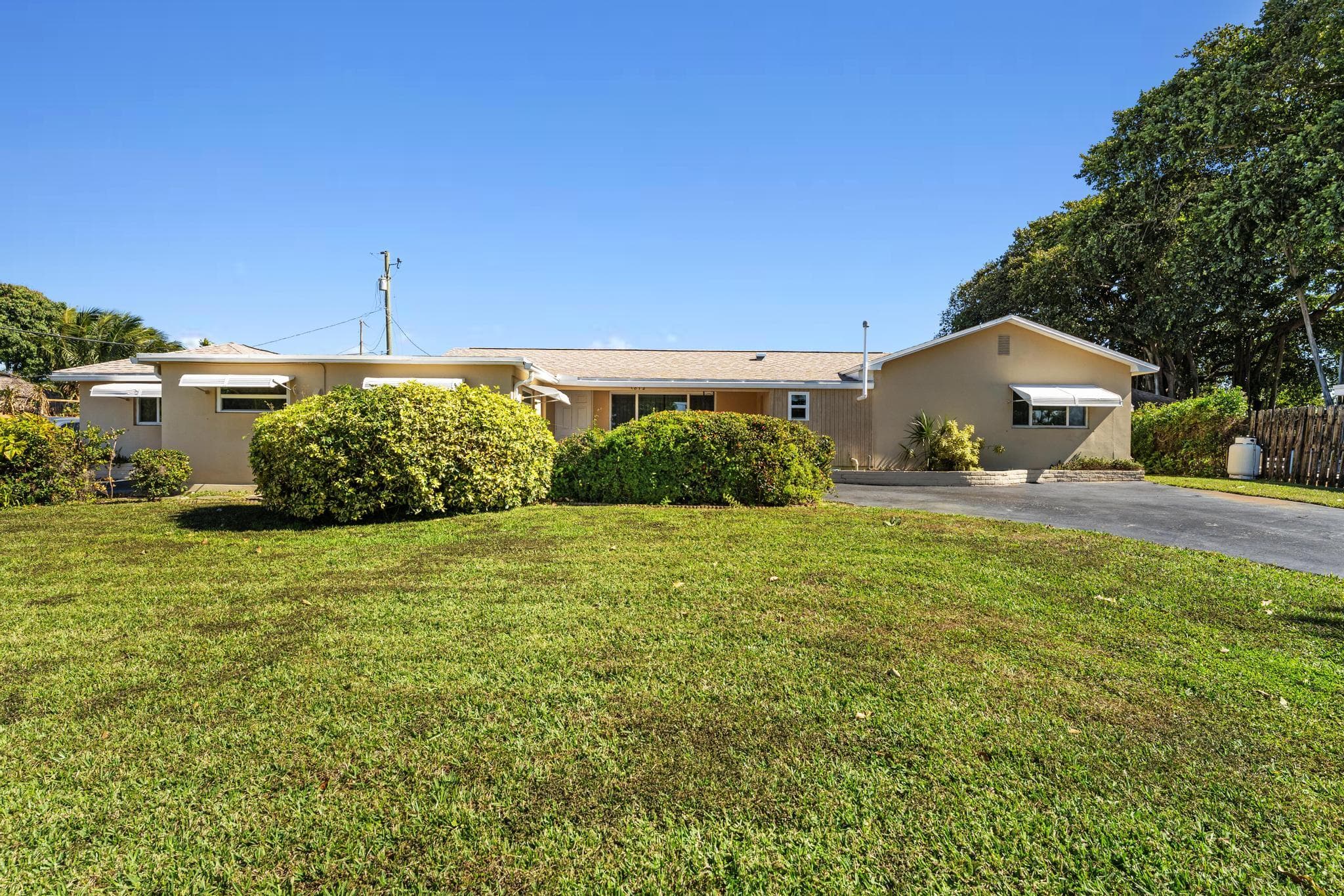 1812 High Ridge Road, Lake Worth, FL 33461 — photo 1 of 44