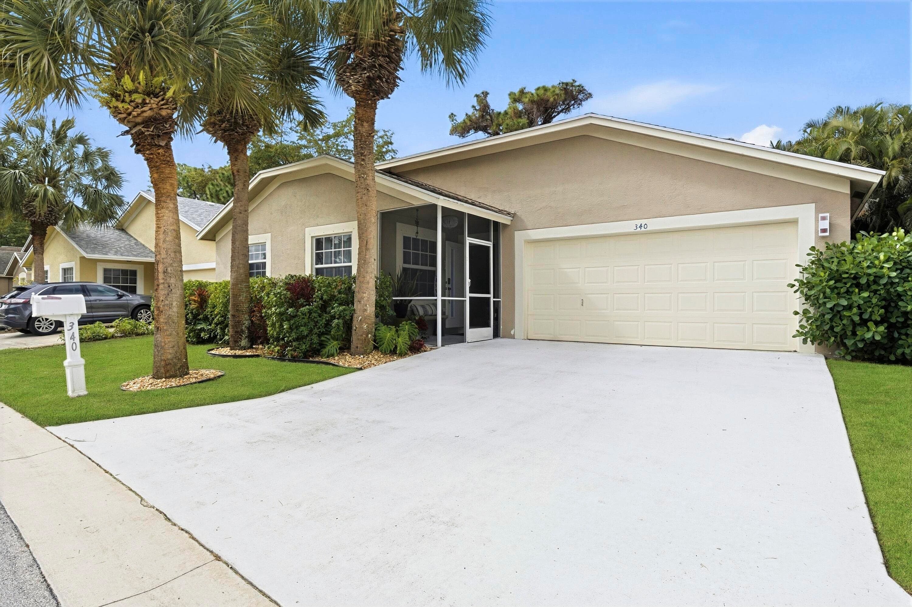 340 Hammocks Trail, Greenacres, FL 33413 — photo 1 of 36