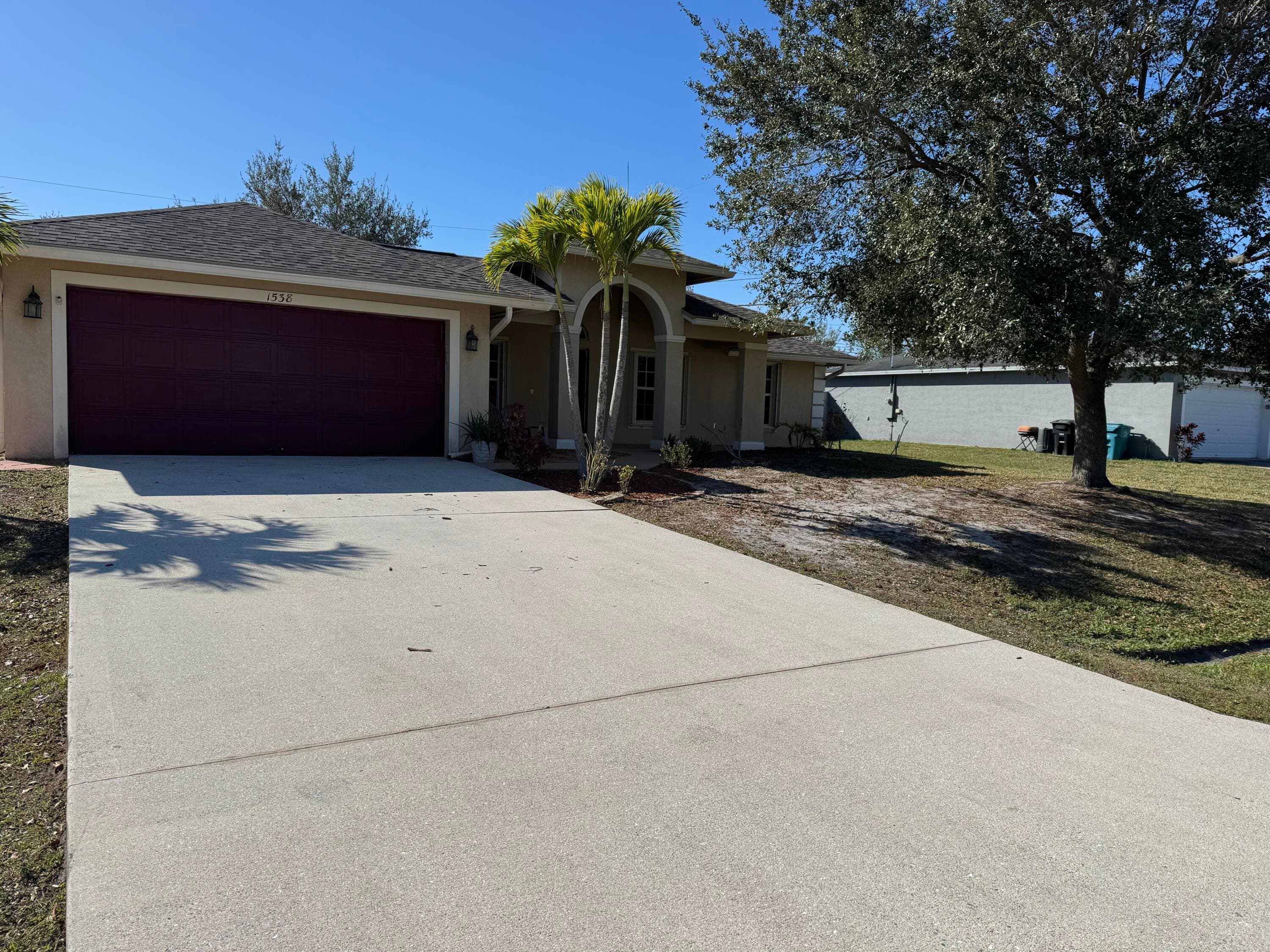 1538 SW Calmar Avenue, Port St. Lucie, FL 34953 — photo 4 of 39