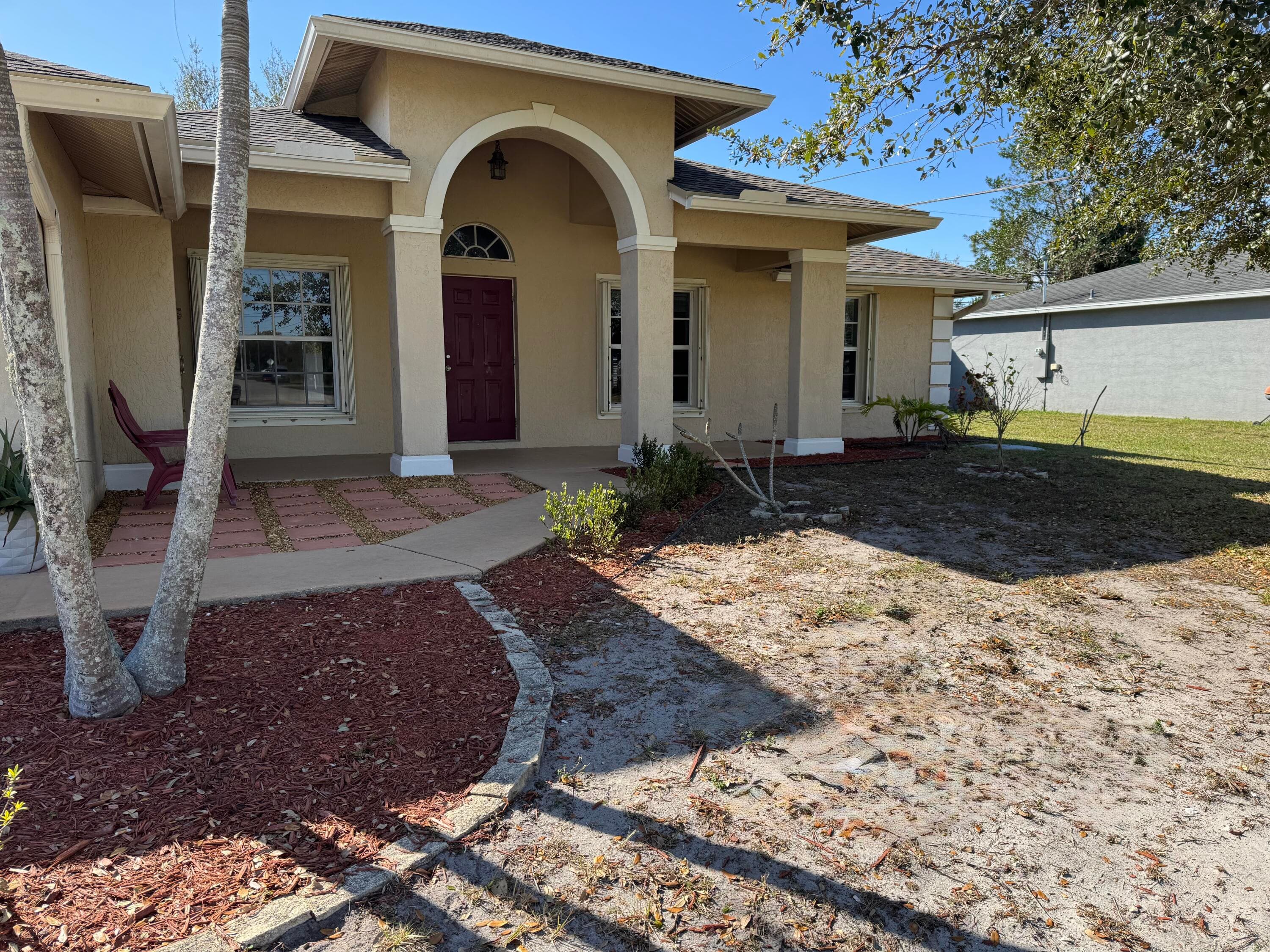 1538 SW Calmar Avenue, Port St. Lucie, FL 34953 — photo 3 of 39