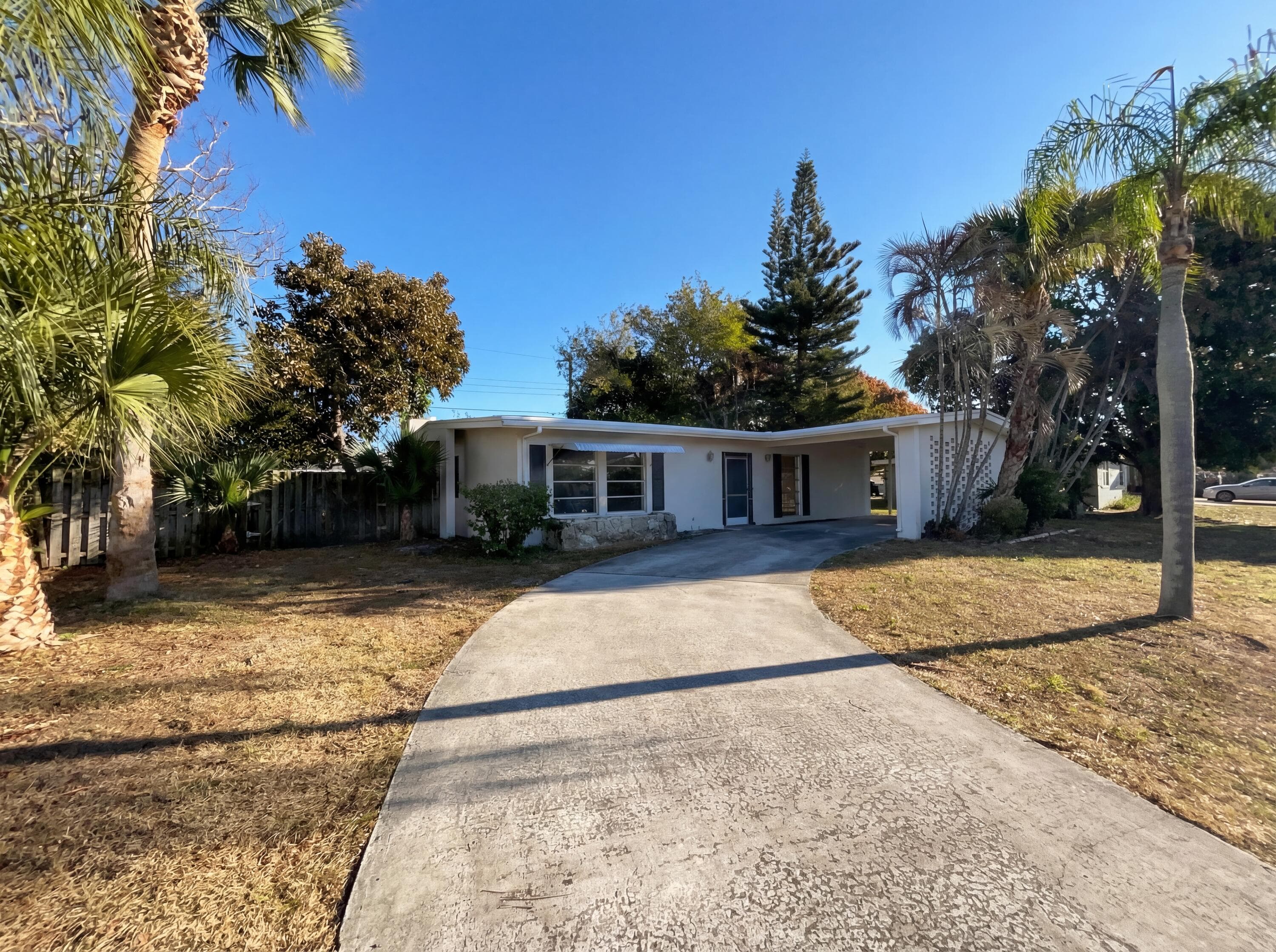 141 SE Calmoso Drive, Port St. Lucie, FL 34983 — photo 1 of 26