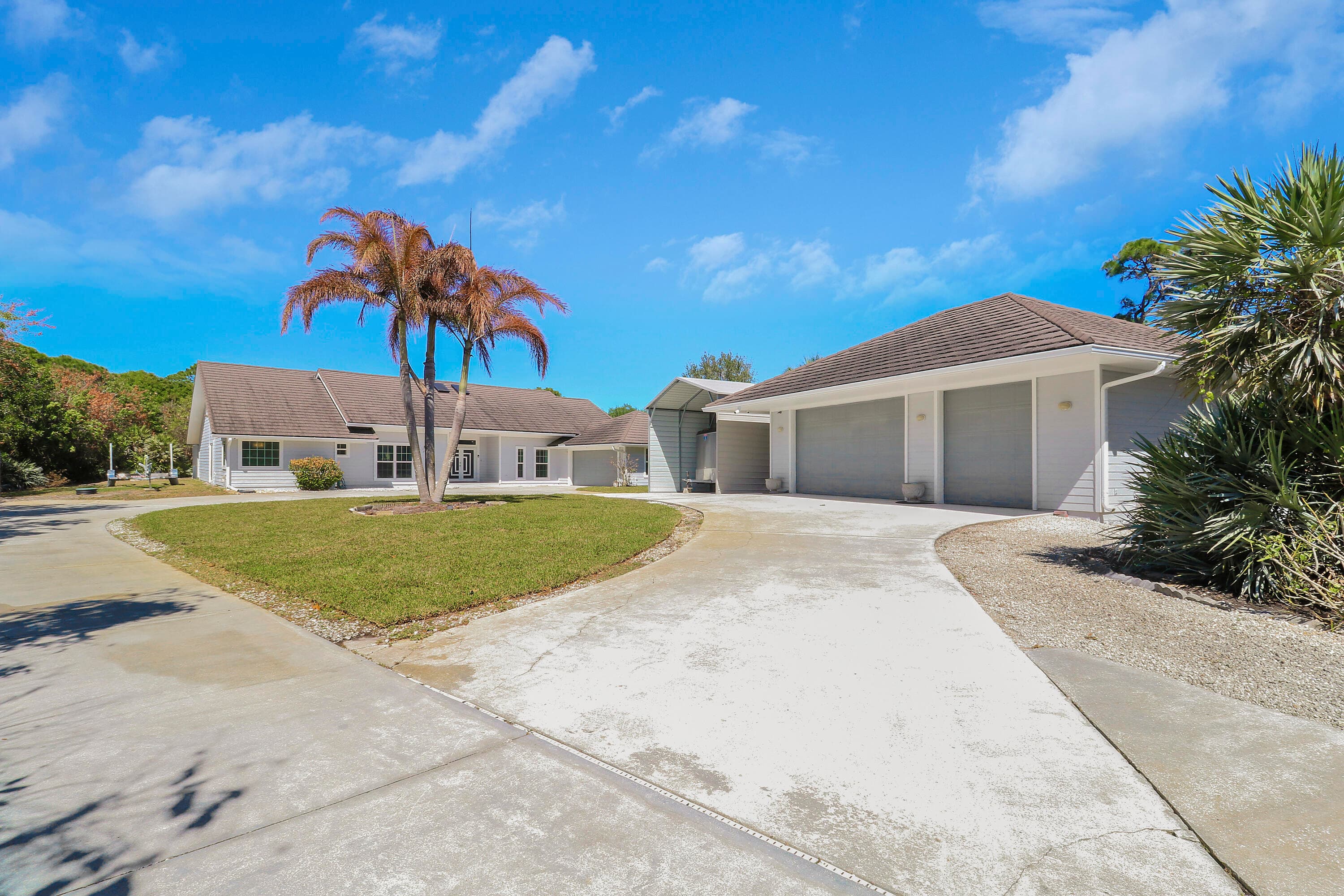 815 NE Stokes Terrace, Jensen Beach, FL 34957 — photo 2 of 45