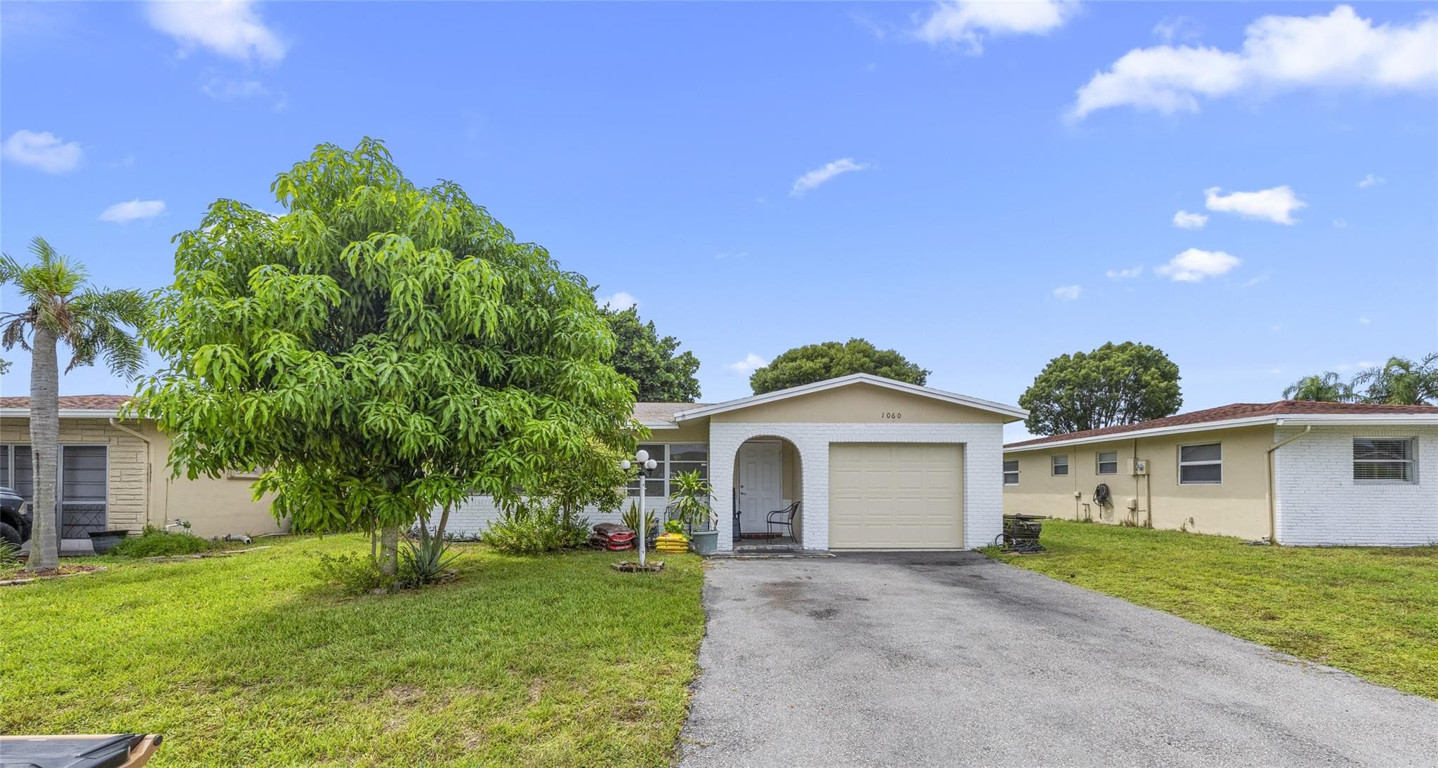 1060 NW 49th Court, Deerfield Beach, FL 33064 — photo 1 of 31