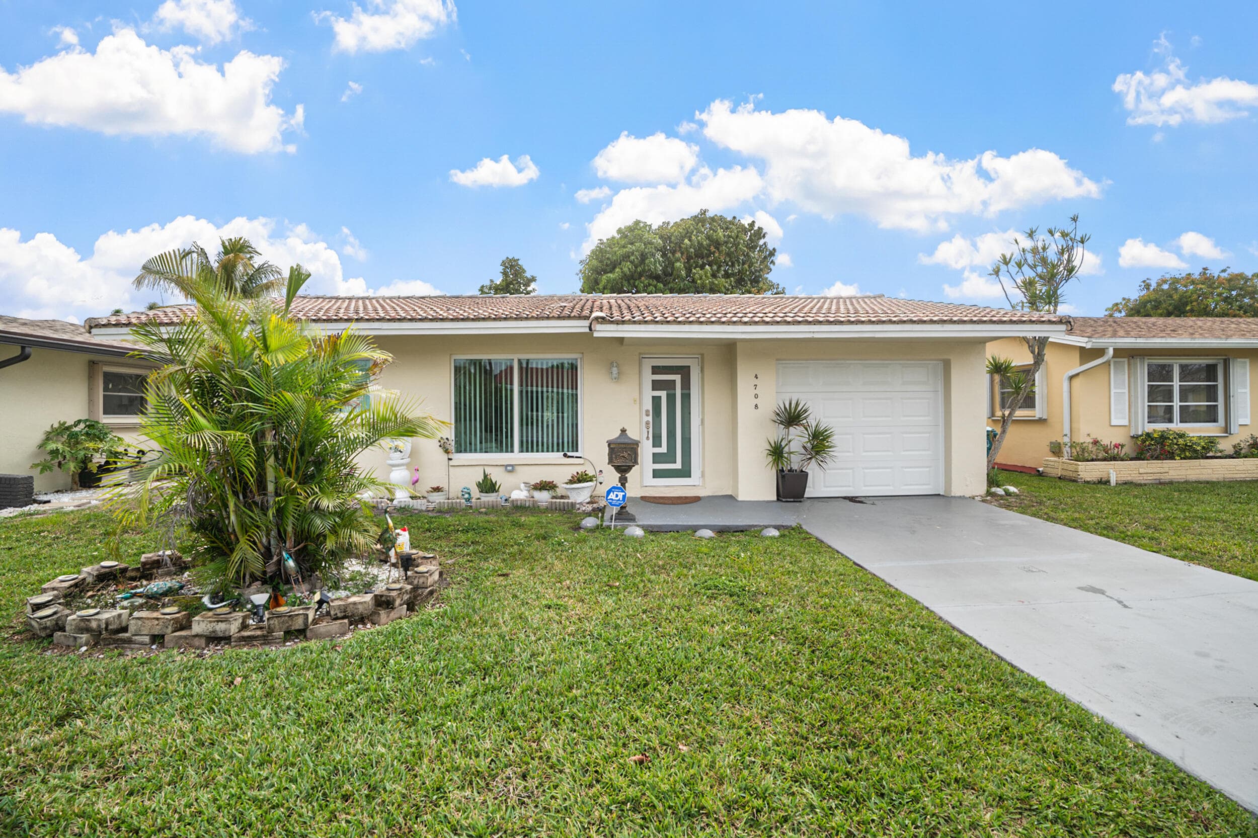 4708 NW 49th Drive, Tamarac, FL 33319 — photo 1 of 35