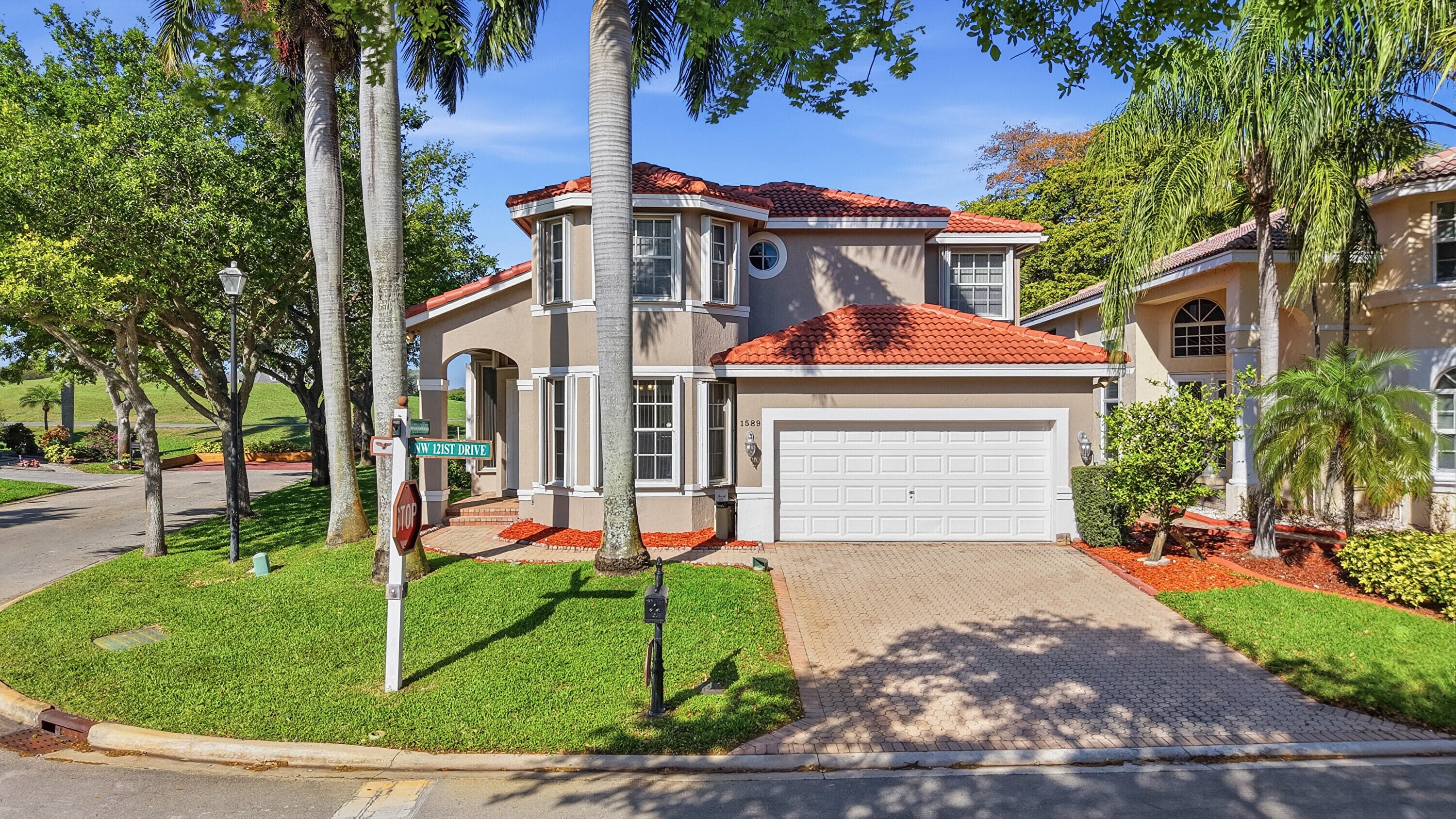 1589 NW 121st Drive, Coral Springs, FL 33071 — photo 1 of 48